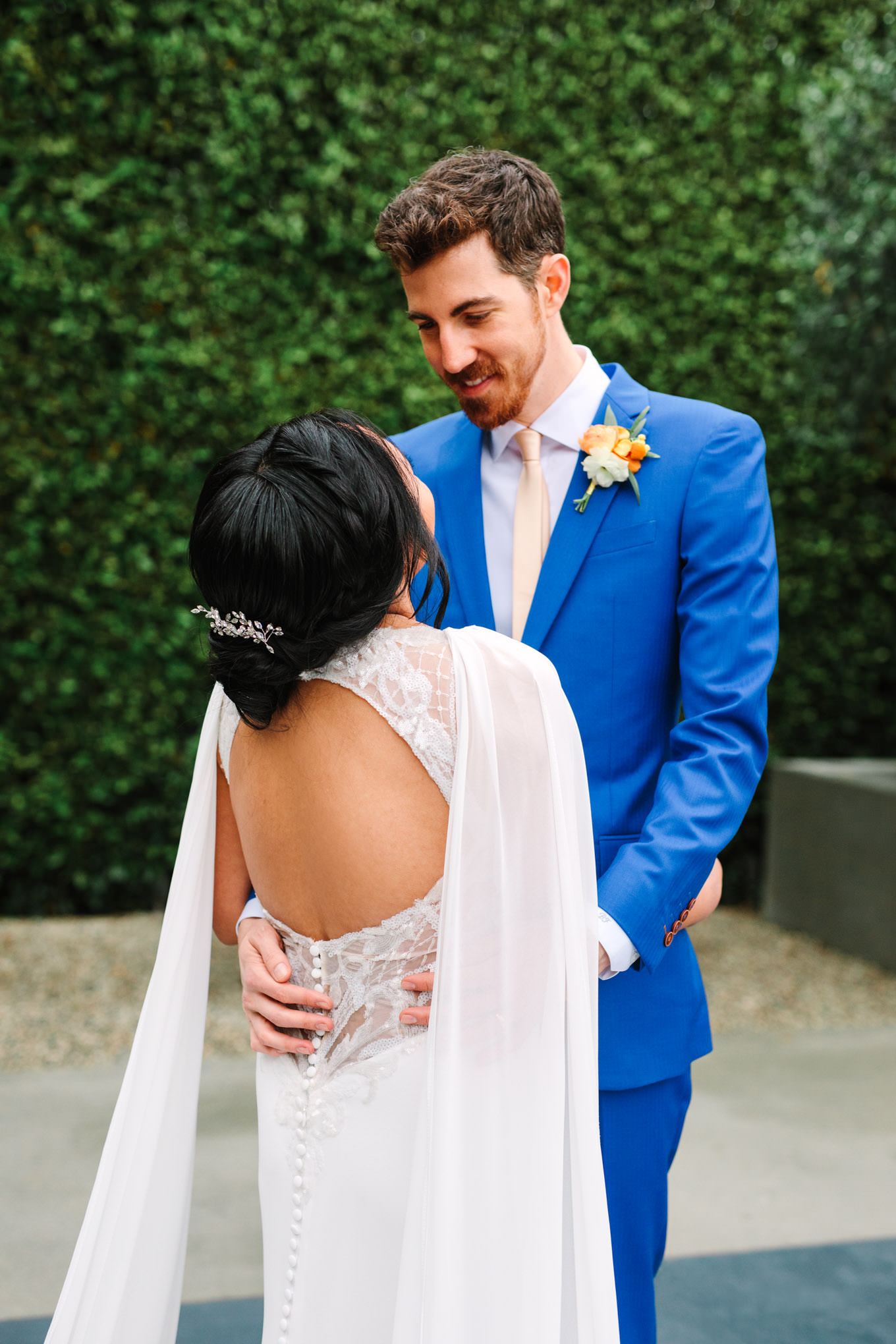 Bride with cape dress and open back | TV inspired wedding at The Fig House Los Angeles | Published on The Knot | Fresh and colorful photography for fun-loving couples in Southern California | #losangeleswedding #TVwedding #colorfulwedding #theknot   Source: Mary Costa Photography | Los Angeles wedding photographer
