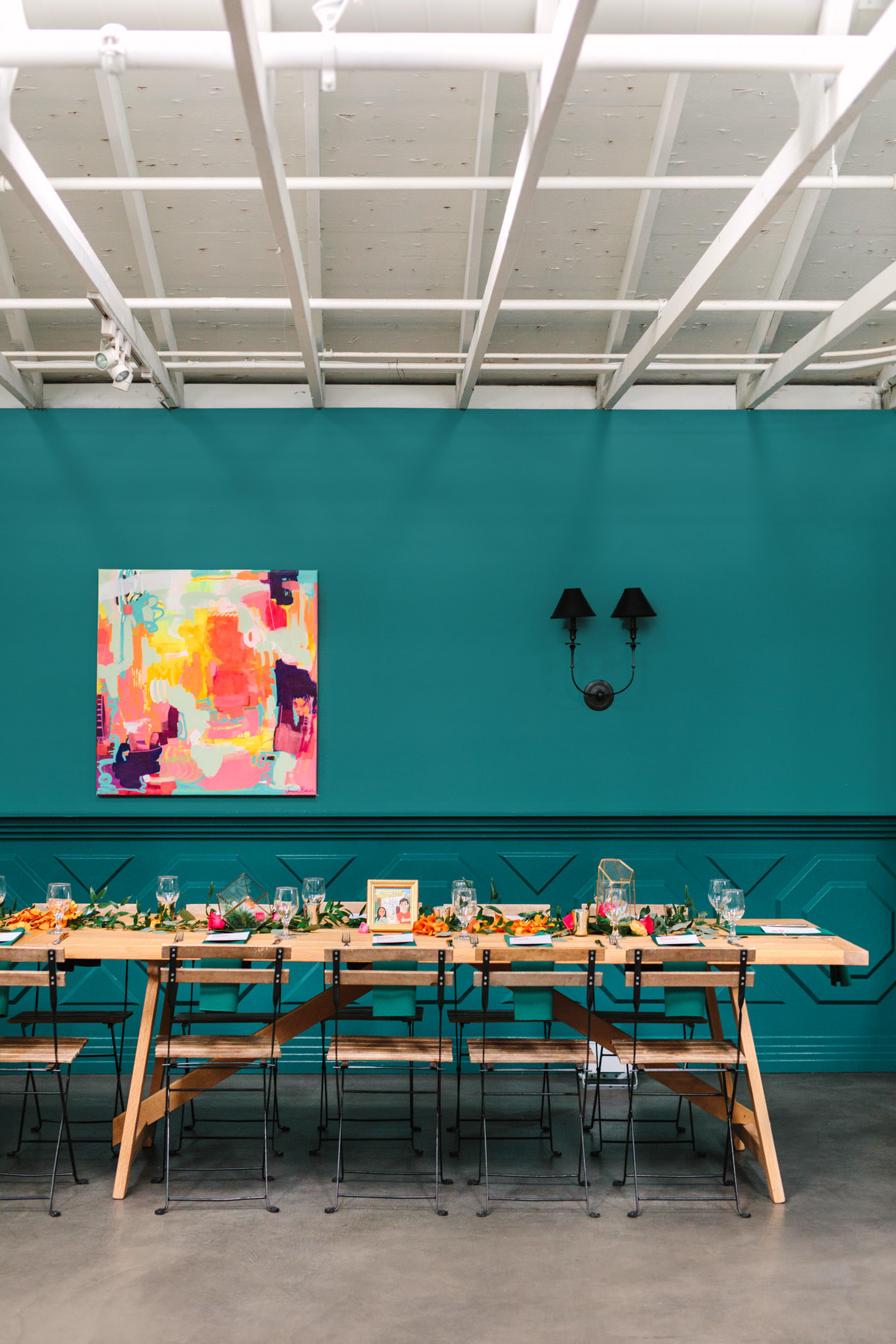 Colorful indoor reception with vibrant painting | TV inspired wedding at The Fig House Los Angeles | Published on The Knot | Fresh and colorful photography for fun-loving couples in Southern California | #losangeleswedding #TVwedding #colorfulwedding #theknot   Source: Mary Costa Photography | Los Angeles wedding photographer
