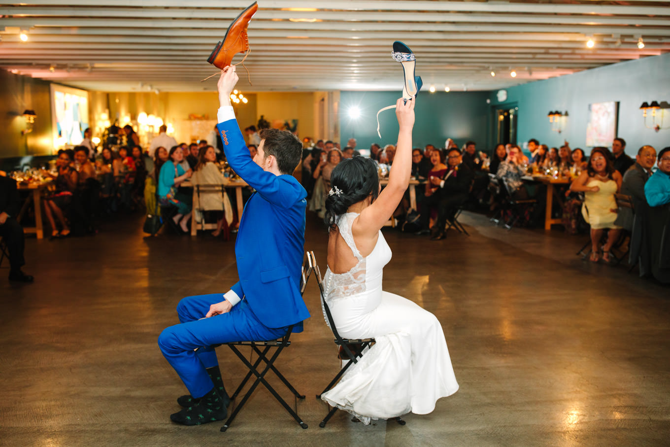 Shoe game at wedding reception | TV inspired wedding at The Fig House Los Angeles | Published on The Knot | Fresh and colorful photography for fun-loving couples in Southern California | #losangeleswedding #TVwedding #colorfulwedding #theknot   Source: Mary Costa Photography | Los Angeles wedding photographer