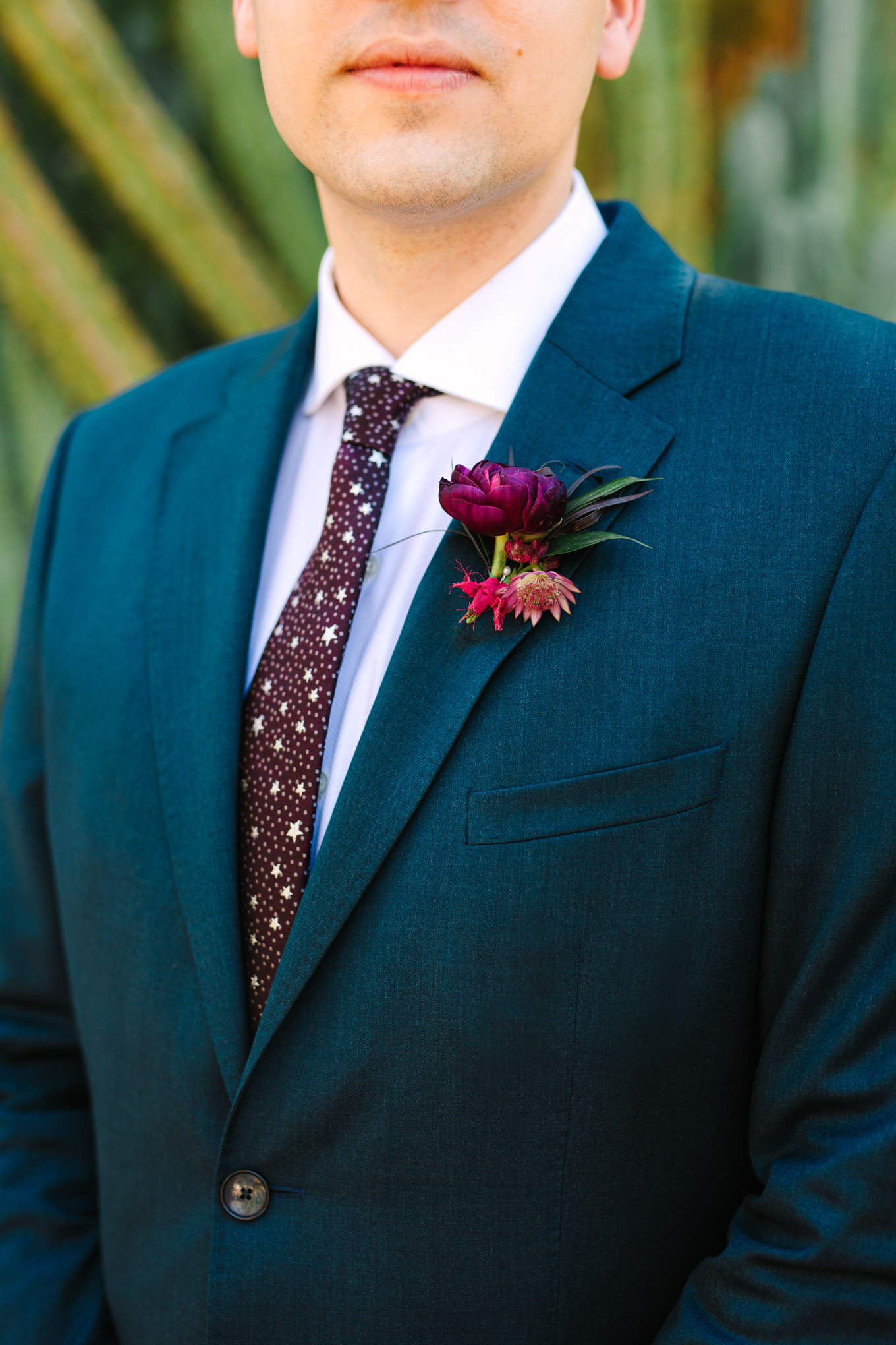 Jewel tone suit with burgundy celestial tie | Colorful jewel tone Palm Springs elopement | Fresh and colorful photography for fun-loving couples in Southern California | #colorfulelopement #palmspringselopement #elopementphotography #palmspringswedding Source: Mary Costa Photography | Los Angeles
