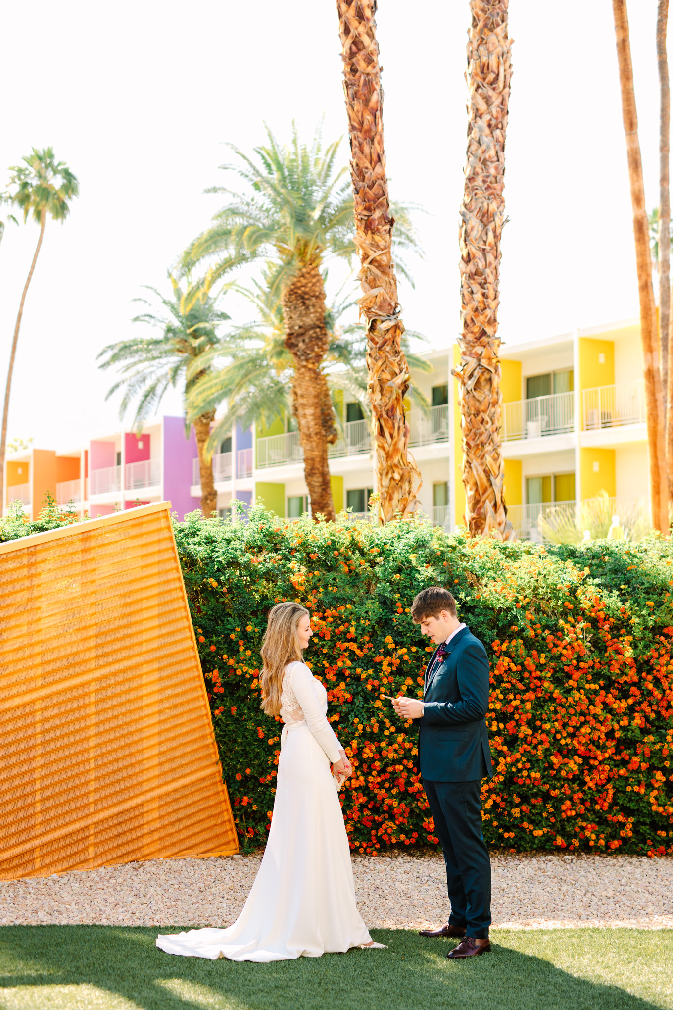 Vow exchange at Saguaro Hotel | Colorful jewel tone Palm Springs elopement | Fresh and colorful photography for fun-loving couples in Southern California | #colorfulelopement #palmspringselopement #elopementphotography #palmspringswedding Source: Mary Costa Photography | Los Angeles