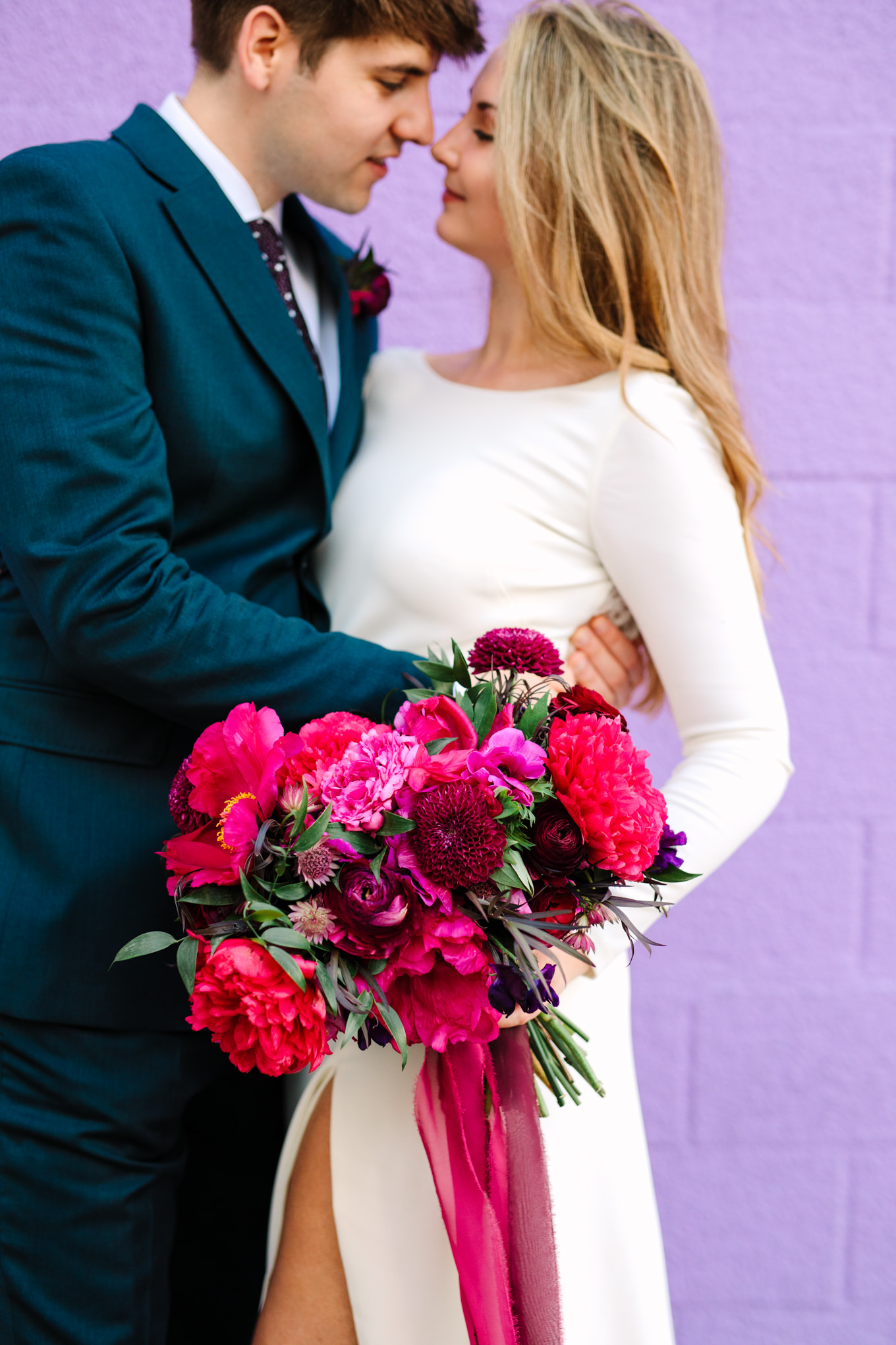 Close up on jewel tone bouquet at colorful Saguaro Hotel | Colorful jewel tone Palm Springs elopement | Fresh and colorful photography for fun-loving couples in Southern California | #colorfulelopement #palmspringselopement #elopementphotography #palmspringswedding Source: Mary Costa Photography | Los Angeles