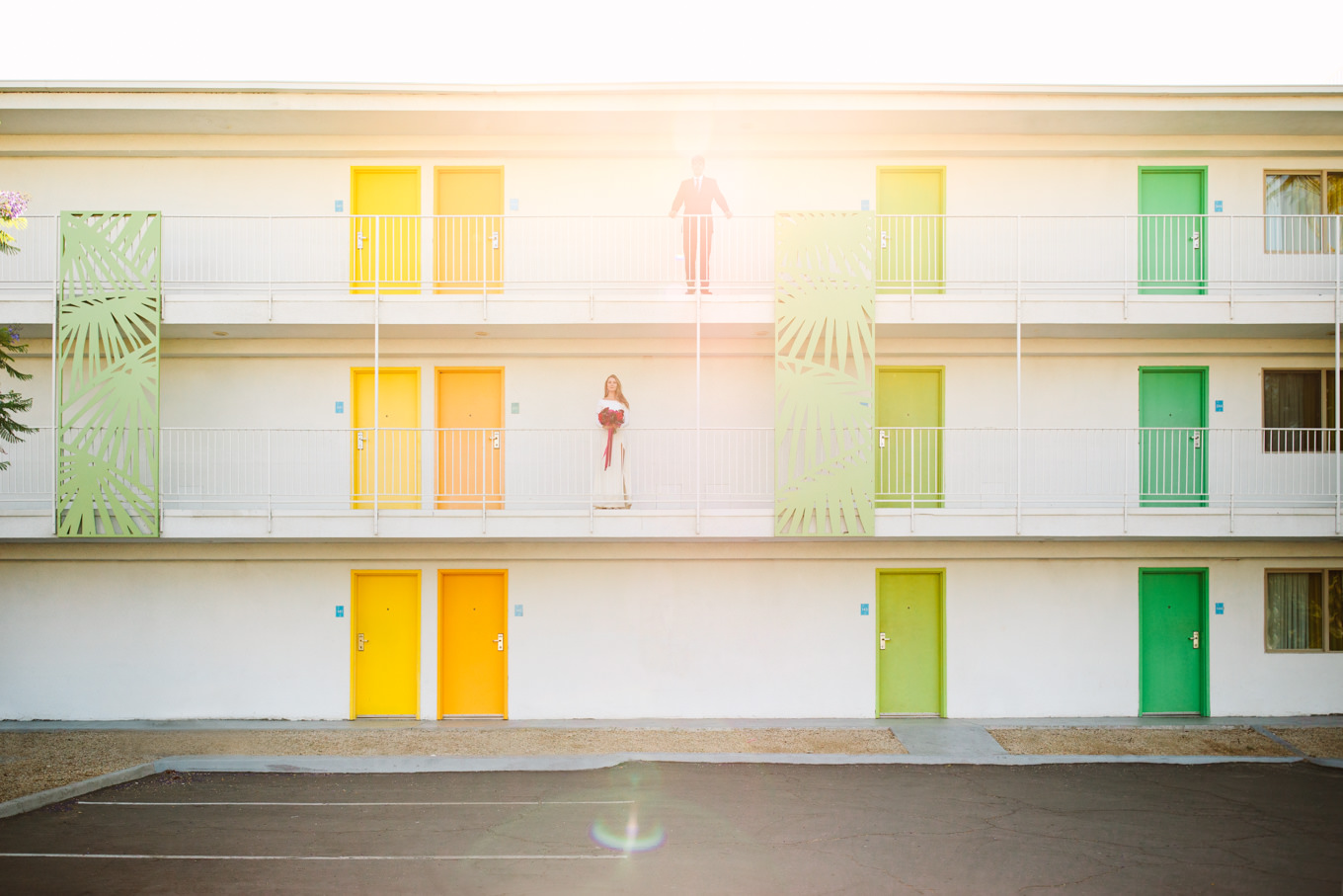 Bride and groom walking at colorful Saguaro Hotel | Colorful jewel tone Palm Springs elopement | Fresh and colorful photography for fun-loving couples in Southern California | #colorfulelopement #palmspringselopement #elopementphotography #palmspringswedding Source: Mary Costa Photography | Los Angeles