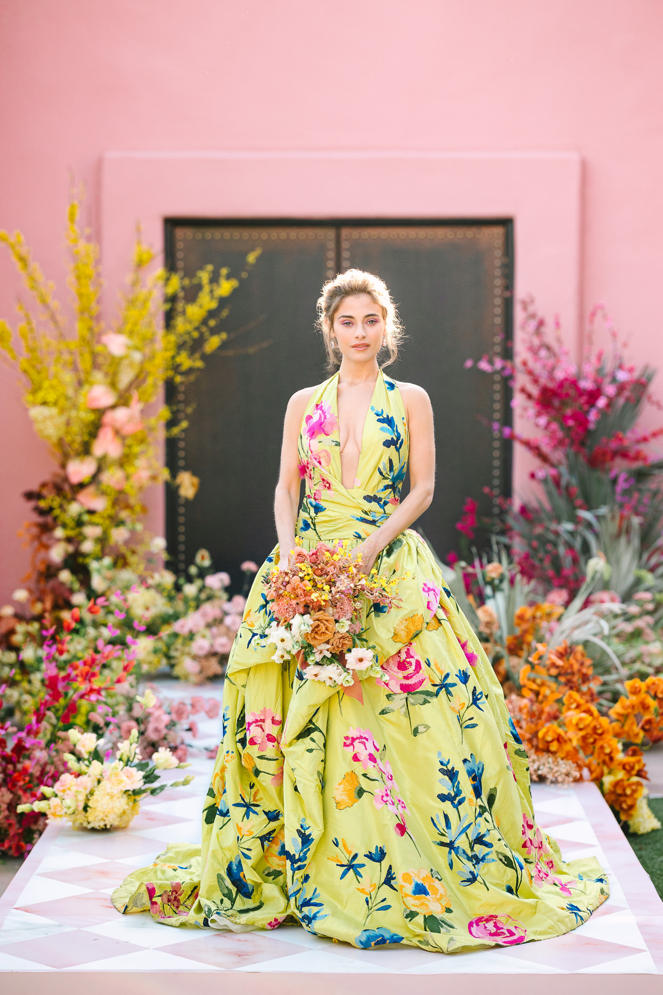 Chartreuse floral Marchesa gown on checkered runway | Kindred Presets x Mary Costa Photography Sands Hotel Ad Campaign | Colorful Palm Springs wedding photography | #palmspringsphotographer #lightroompresets #sandshotel #pinkhotel   Source: Mary Costa Photography | Los Angeles