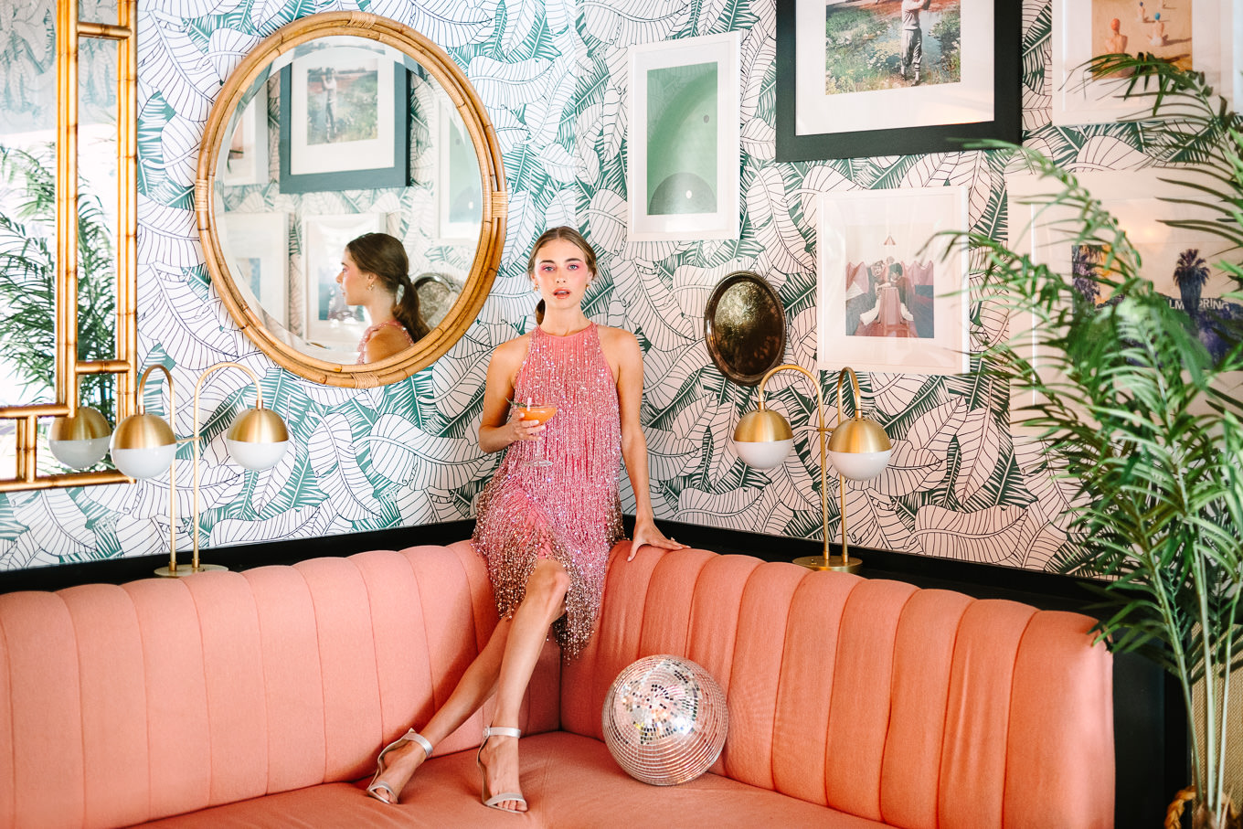 Disco ball in Pink Cabana Restaurant with pink beaded Naeem Khan dress | Kindred Presets x Mary Costa Photography Sands Hotel Ad Campaign | Colorful Palm Springs wedding photography | #palmspringsphotographer #lightroompresets #sandshotel #pinkhotel   Source: Mary Costa Photography | Los Angeles