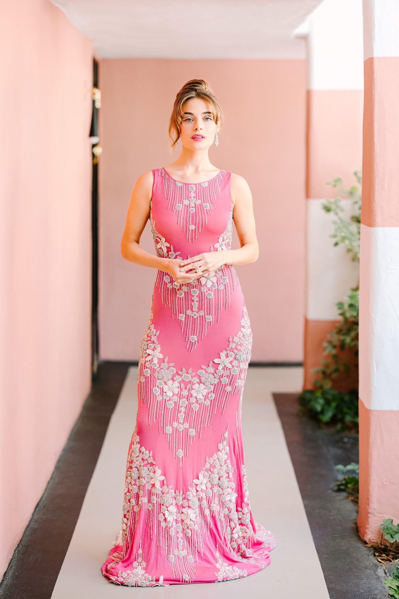 Naeem Khan pink gown in pink Sands Hotel hallway | Kindred Presets x Mary Costa Photography Sands Hotel Ad Campaign | Colorful Palm Springs wedding photography | #palmspringsphotographer #lightroompresets #sandshotel #pinkhotel   Source: Mary Costa Photography | Los Angeles