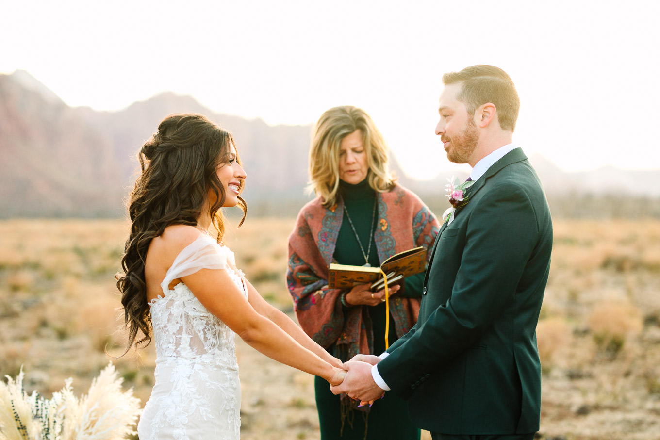 Private wedding ceremony | Zion Under Canvas camping elopement at sunrise | Colorful elopement photography | #utahelopement #zionelopement #zionwedding #undercanvaszion #sunriseelopement #adventureelopement  Source: Mary Costa Photography | Los Angeles