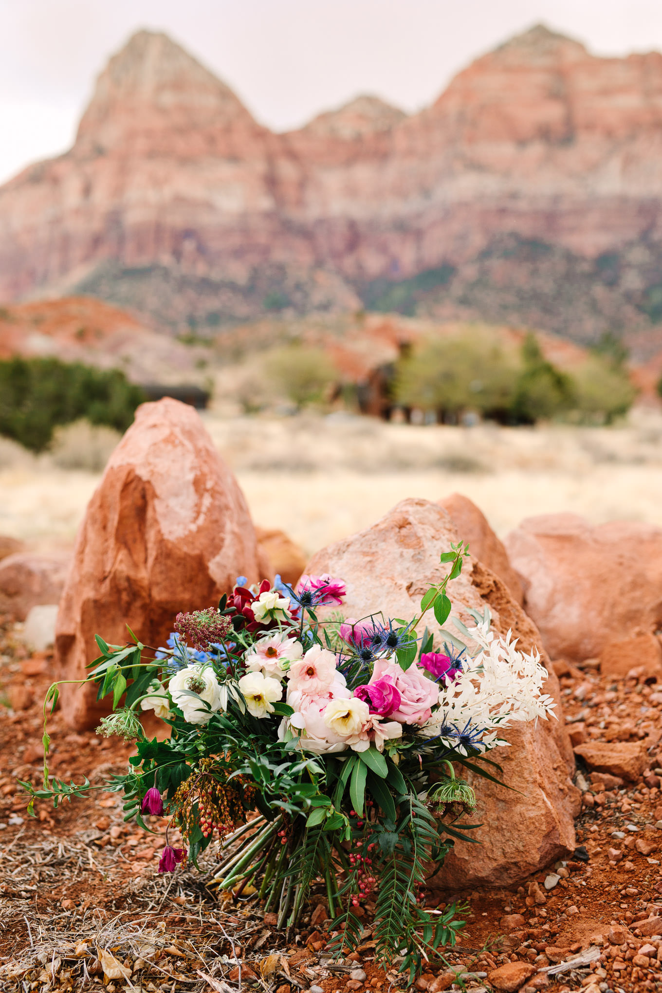 Colorful bouquet | Zion National Park elopement | Colorful adventure elopement photography | #utahelopement #zionelopement #zionwedding #undercanvaszion   Source: Mary Costa Photography | Los Angeles