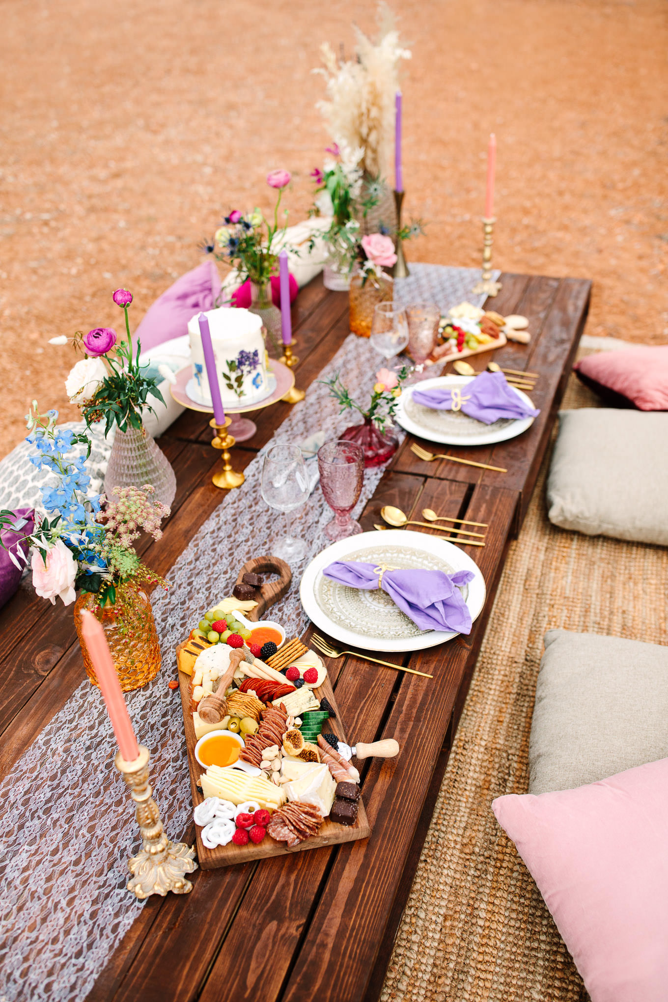 Purple and jewel tone picnic setup | Zion National Park elopement | Colorful adventure elopement photography | #utahelopement #zionelopement #zionwedding #undercanvaszion #picnicwedding  Source: Mary Costa Photography | Los Angeles