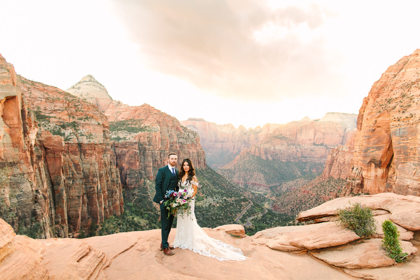 Canyon overlook portrait | Zion National Park sunset elopement scenic overlook | Colorful adventure elopement photography | #utahelopement #zionelopement #zionwedding #undercanvaszion   Source: Mary Costa Photography | Los Angeles