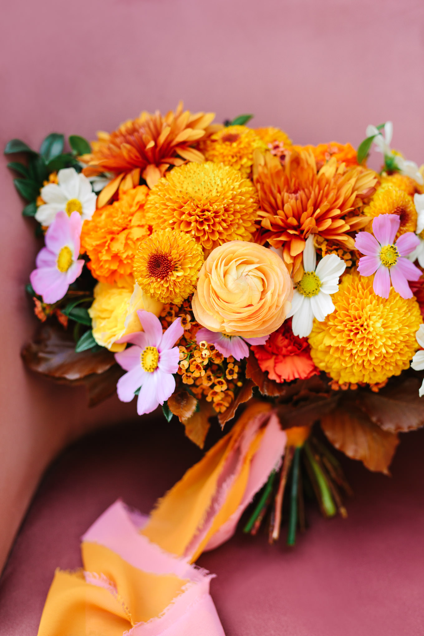 Orange, pink, white floral bouquet | Vibrant backyard micro wedding featured on Green Wedding Shoes | Colorful LA wedding photography | #losangeleswedding #backyardwedding #microwedding #laweddingphotographer Source: Mary Costa Photography | Los Angeles