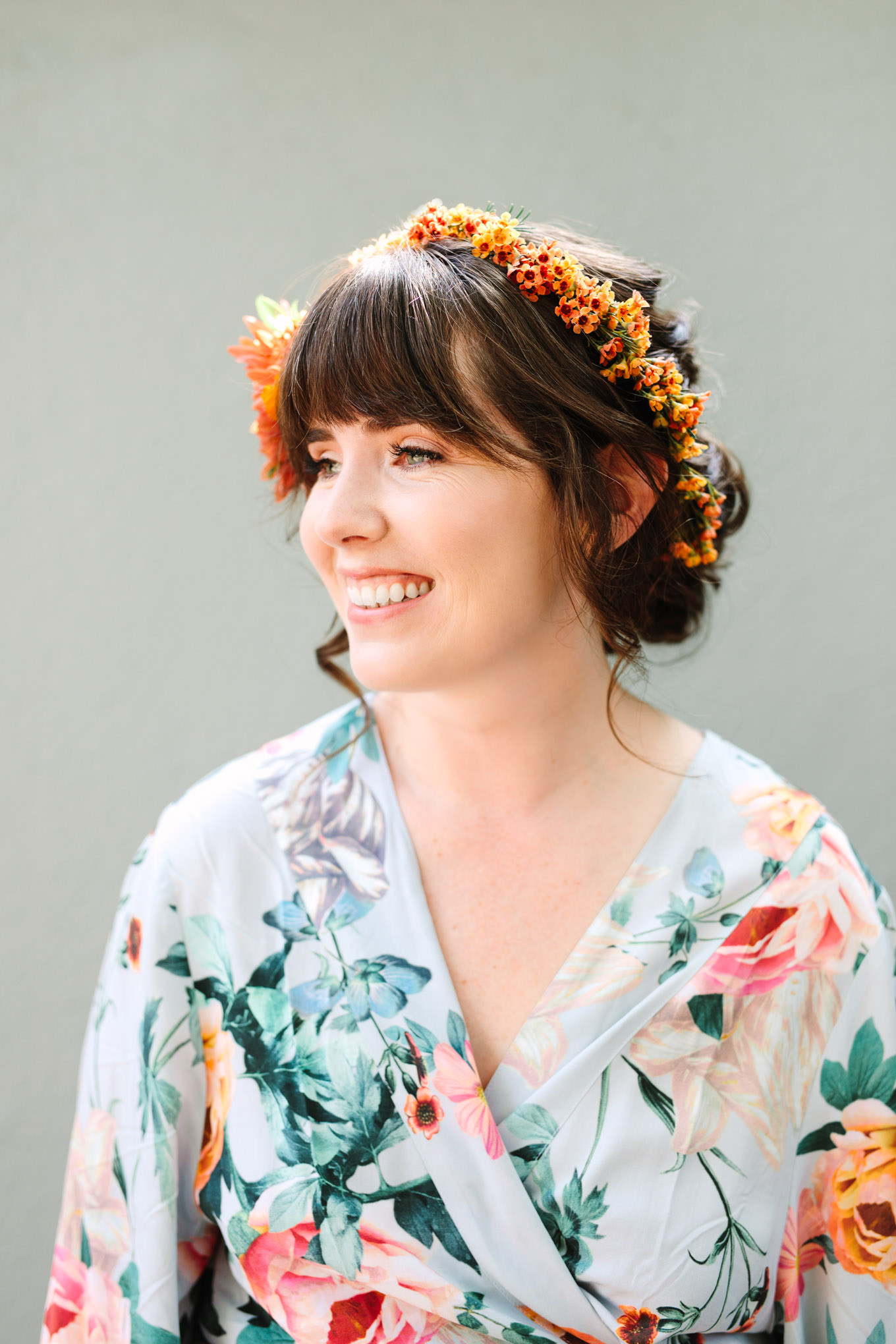 Bride in flowing, floral robe | Vibrant backyard micro wedding featured on Green Wedding Shoes | Colorful LA wedding photography | #losangeleswedding #backyardwedding #microwedding #laweddingphotographer Source: Mary Costa Photography | Los Angeles