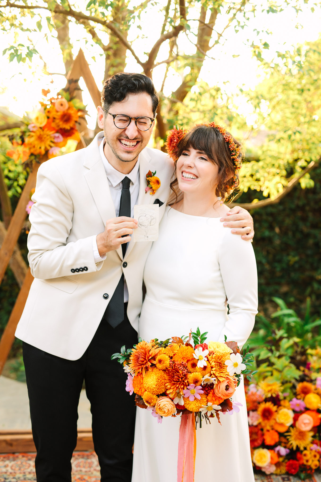Candid portrait of the bride and groom | Vibrant backyard micro wedding featured on Green Wedding Shoes | Colorful LA wedding photography | #losangeleswedding #backyardwedding #microwedding #laweddingphotographer Source: Mary Costa Photography | Los Angeles