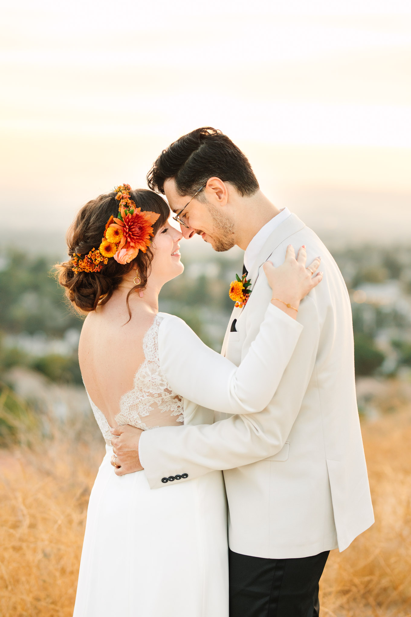 Bride and groom close up portrait face to face | Vibrant backyard micro wedding featured on Green Wedding Shoes | Colorful LA wedding photography | #losangeleswedding #backyardwedding #microwedding #laweddingphotographer Source: Mary Costa Photography | Los Angeles