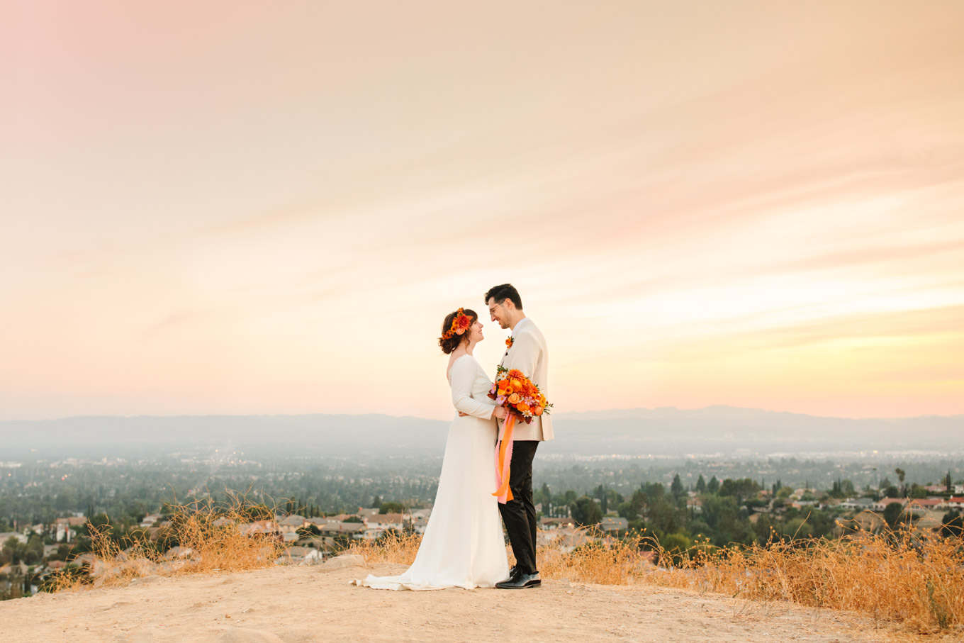 Gorgeous bride and groom photo with ocean views | Vibrant backyard micro wedding featured on Green Wedding Shoes | Colorful LA wedding photography | #losangeleswedding #backyardwedding #microwedding #laweddingphotographer Source: Mary Costa Photography | Los Angeles