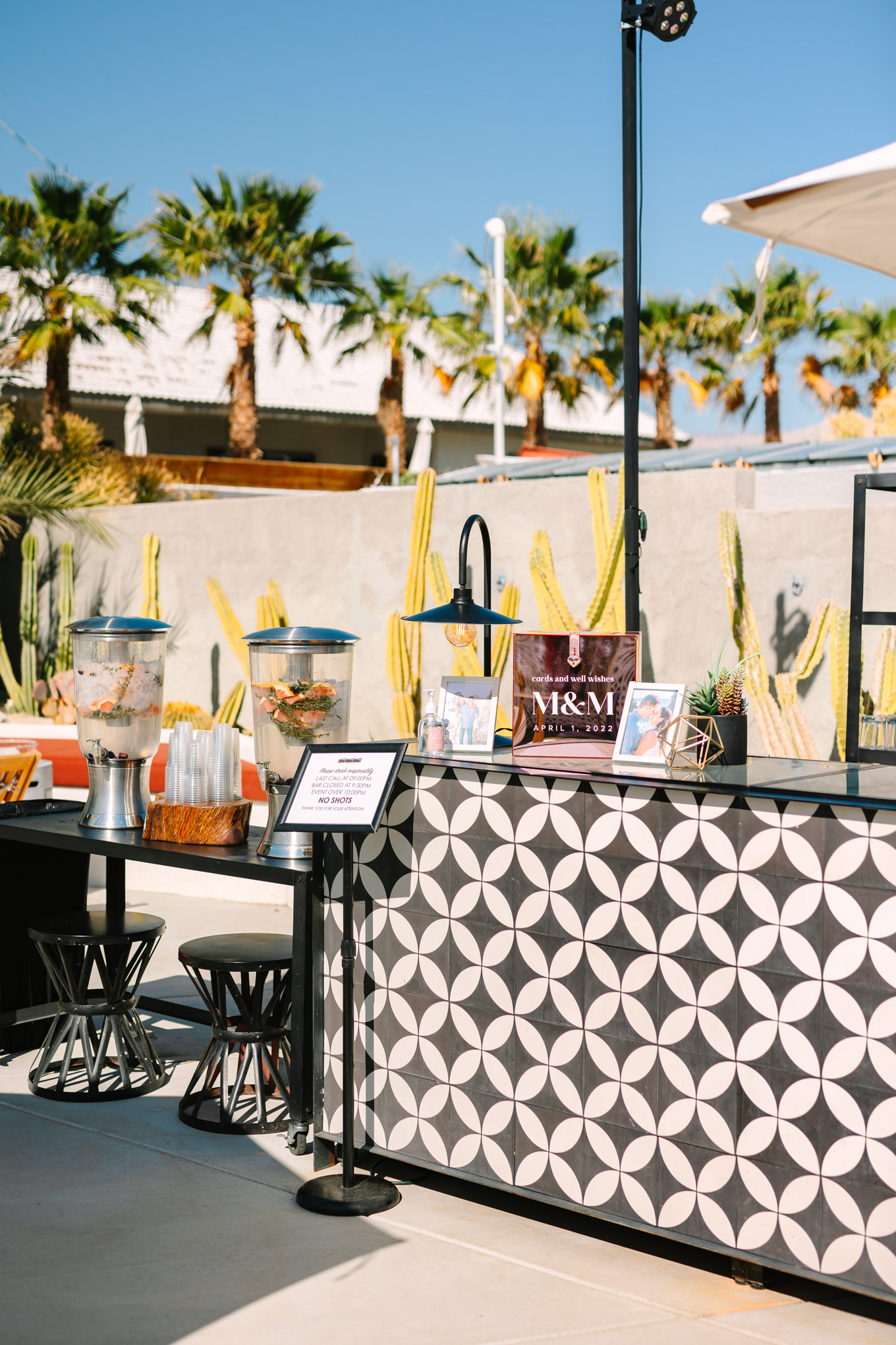 Bar setup at Lautner Compound | Pink and orange Lautner Compound wedding | Colorful Palm Springs wedding photography | #palmspringsphotographer #palmspringswedding #lautnercompound #southerncaliforniawedding  Source: Mary Costa Photography | Los Angeles