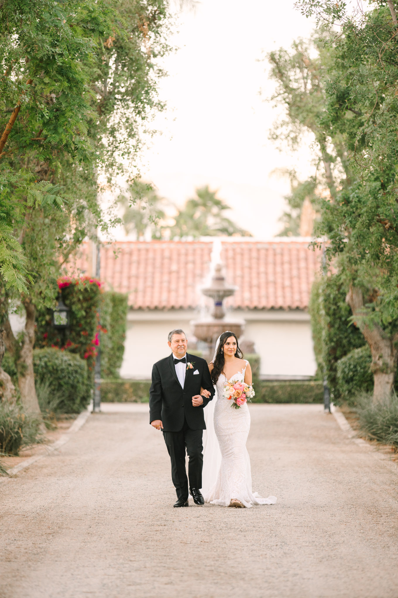 Bride with father | Pink Bougainvillea Estate wedding | Colorful LA wedding photography | #bougainvilleaestate #palmspringswedding #palmspringsweddingvenue #palmspringsphotographer Source: Mary Costa Photography | Los Angeles