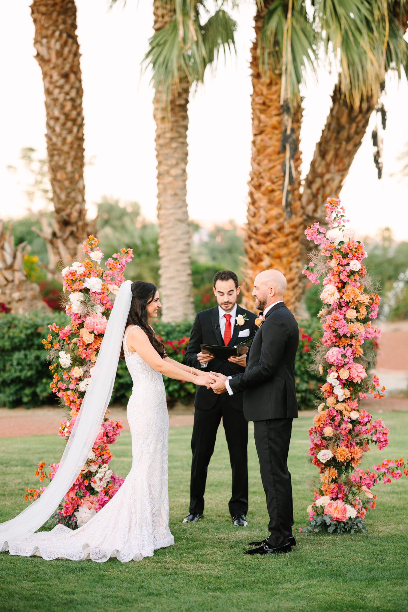 Wedding ceremony | Pink Bougainvillea Estate wedding | Colorful LA wedding photography | #bougainvilleaestate #palmspringswedding #palmspringsweddingvenue #palmspringsphotographer Source: Mary Costa Photography | Los Angeles