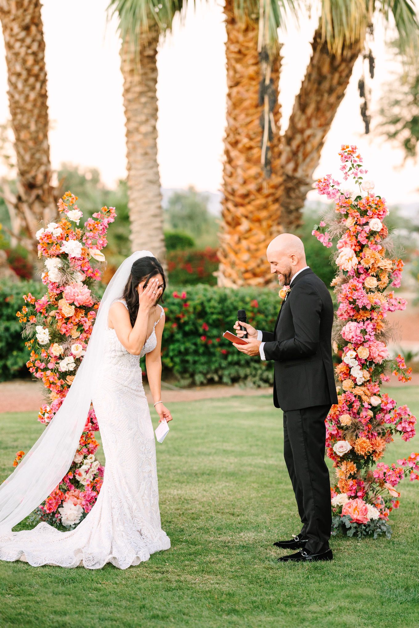 Groom saying vows | Pink Bougainvillea Estate wedding | Colorful LA wedding photography | #bougainvilleaestate #palmspringswedding #palmspringsweddingvenue #palmspringsphotographer Source: Mary Costa Photography | Los Angeles