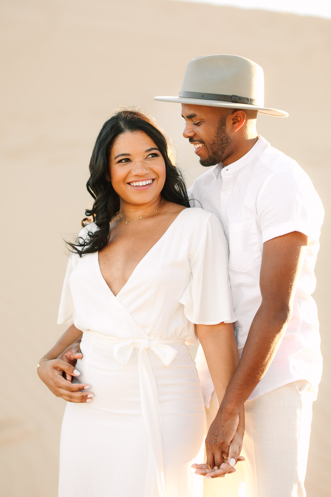 Sunset portrait | California Sand Dunes engagement session | Colorful Palm Springs wedding photography | #palmspringsphotographer #sanddunes #engagementsession #southerncalifornia  Source: Mary Costa Photography | Los Angeles