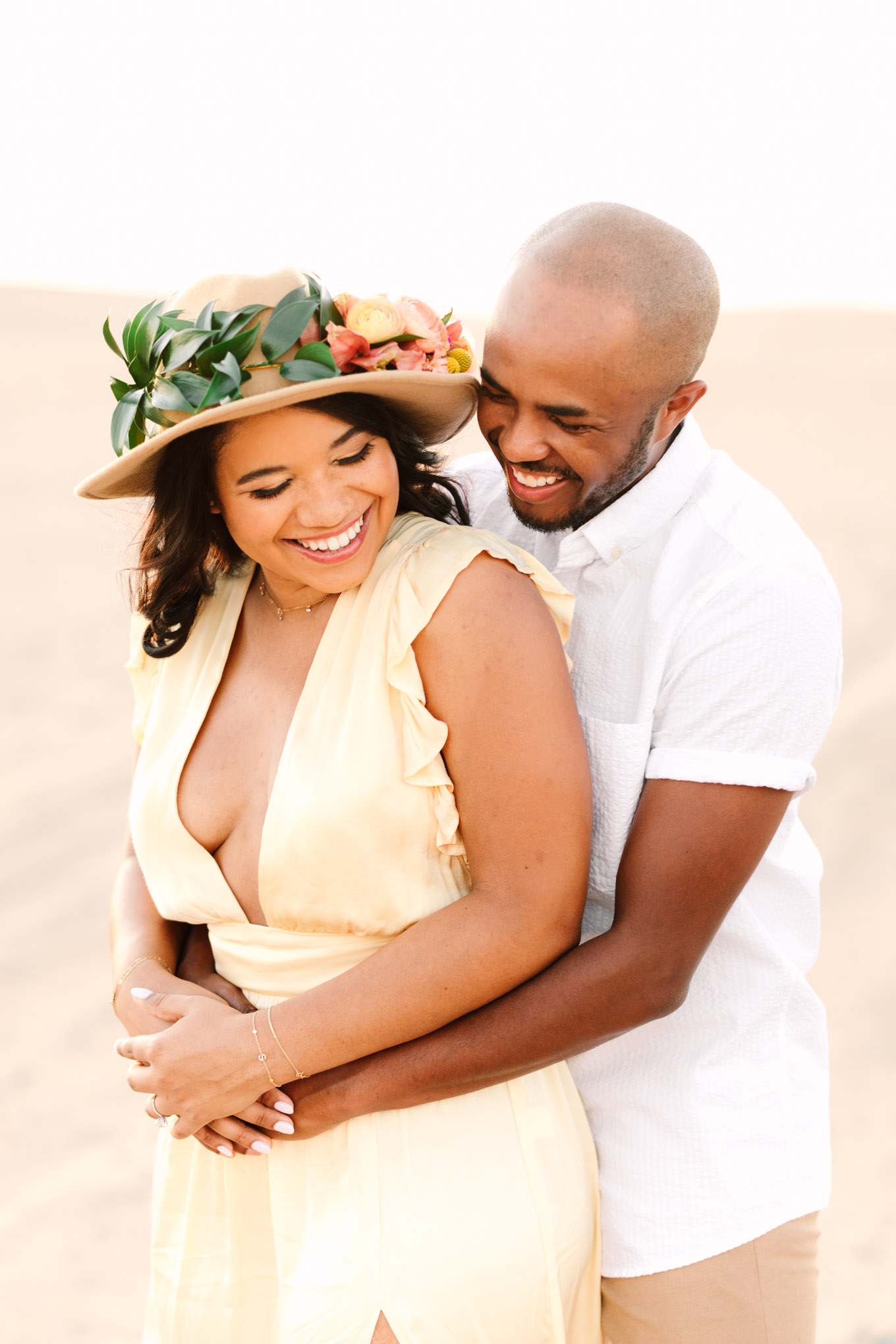 Engaged couple portrait on a sand dune | California Sand Dunes engagement session | Colorful Palm Springs wedding photography | #palmspringsphotographer #sanddunes #engagementsession #southerncalifornia  Source: Mary Costa Photography | Los Angeles