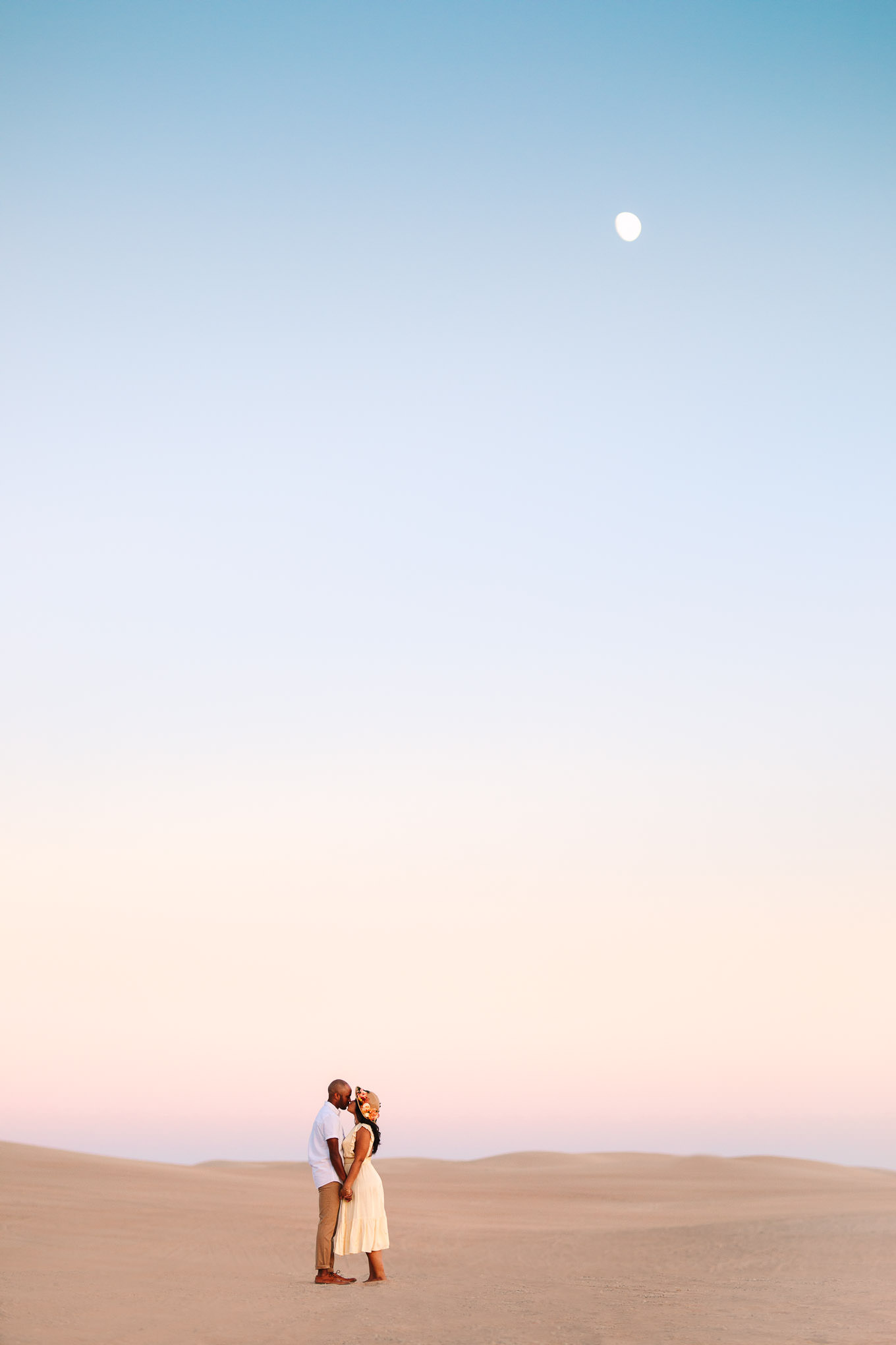 Moon view during engagement session | California Sand Dunes engagement session | Colorful Palm Springs wedding photography | #palmspringsphotographer #sanddunes #engagementsession #southerncalifornia  Source: Mary Costa Photography | Los Angeles