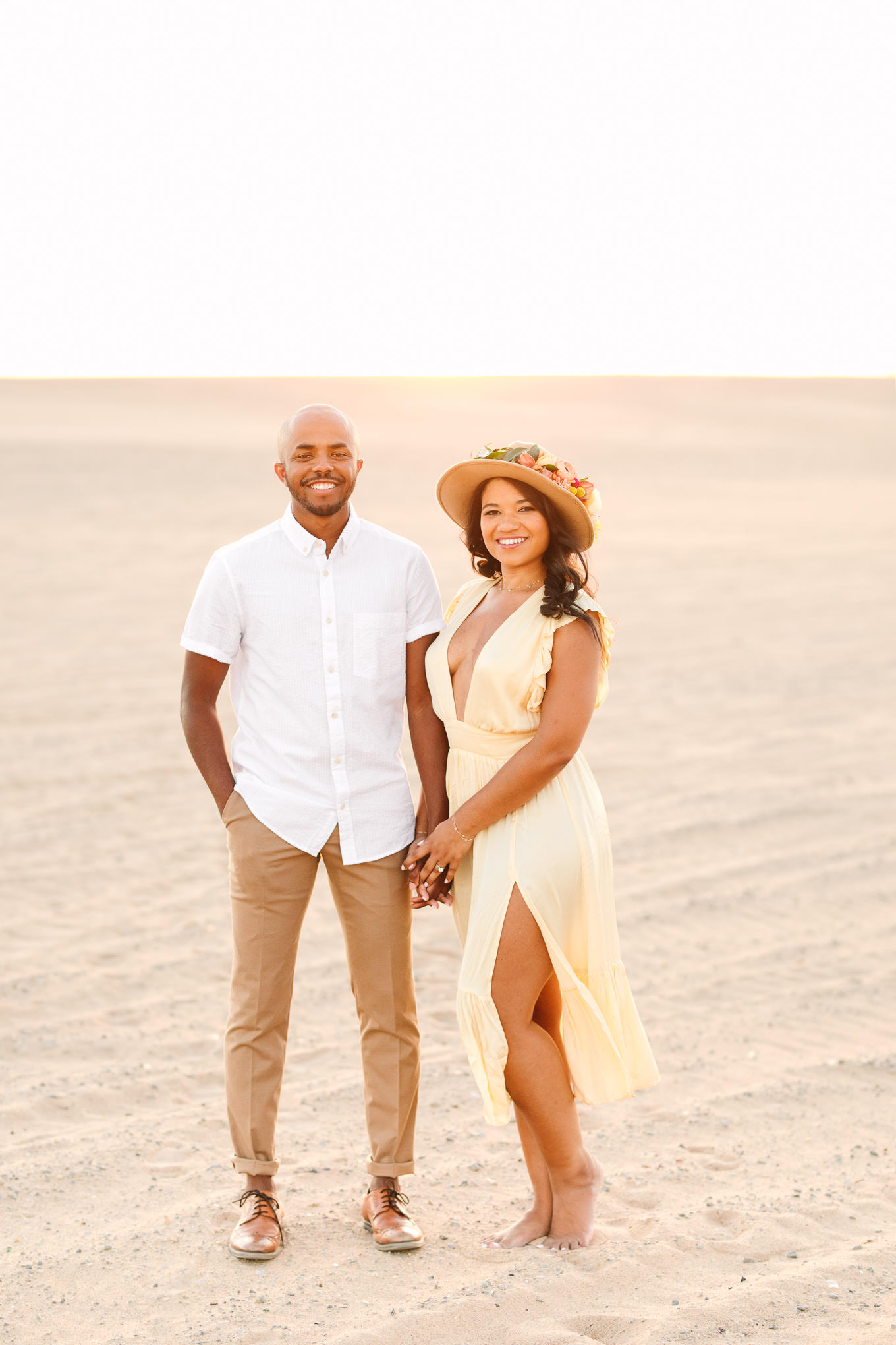 Bride to be wearing a hat at a sand dune | California Sand Dunes engagement session | Colorful Palm Springs wedding photography | #palmspringsphotographer #sanddunes #engagementsession #southerncalifornia  Source: Mary Costa Photography | Los Angeles