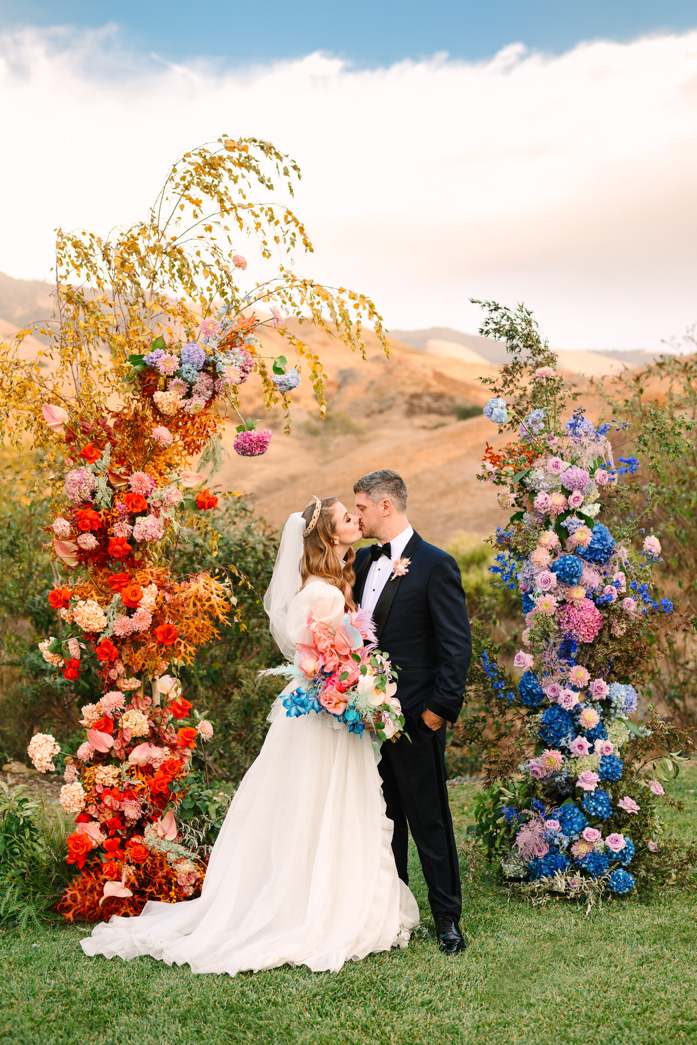 Allison Harvard & Jeremy Burke's floral wedding ceremony | Colorful and quirky wedding at Higuera Ranch in San Luis Obispo | #sanluisobispowedding #californiawedding #higueraranch #madonnainn   Source: Mary Costa Photography | Los Angeles