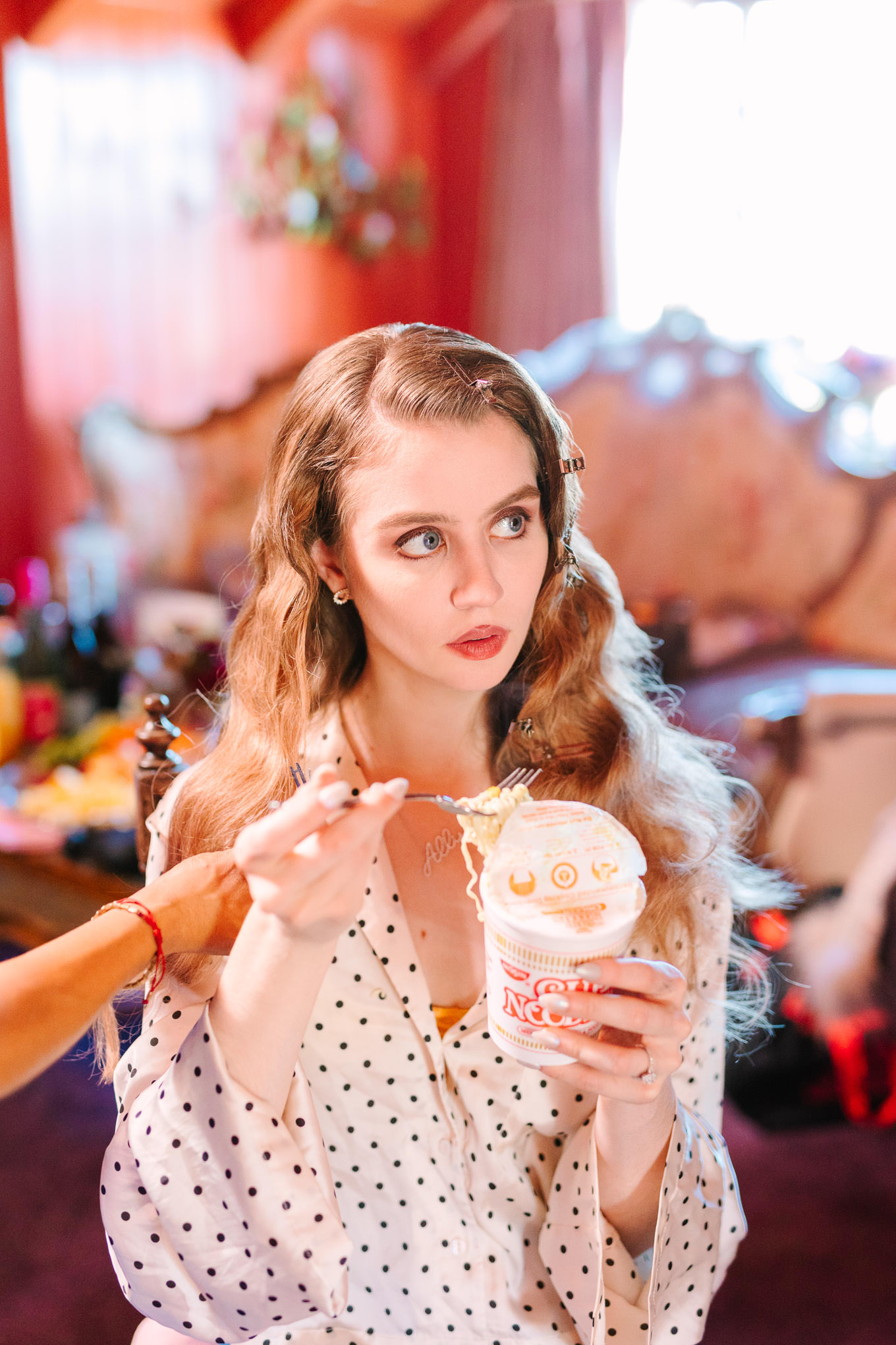 Bride Allison Harvard getting ready on her wedding day with a cup of noodles | Colorful and quirky wedding at Higuera Ranch in San Luis Obispo | #sanluisobispowedding #californiawedding #higueraranch #madonnainn   
Source: Mary Costa Photography | Los Angeles