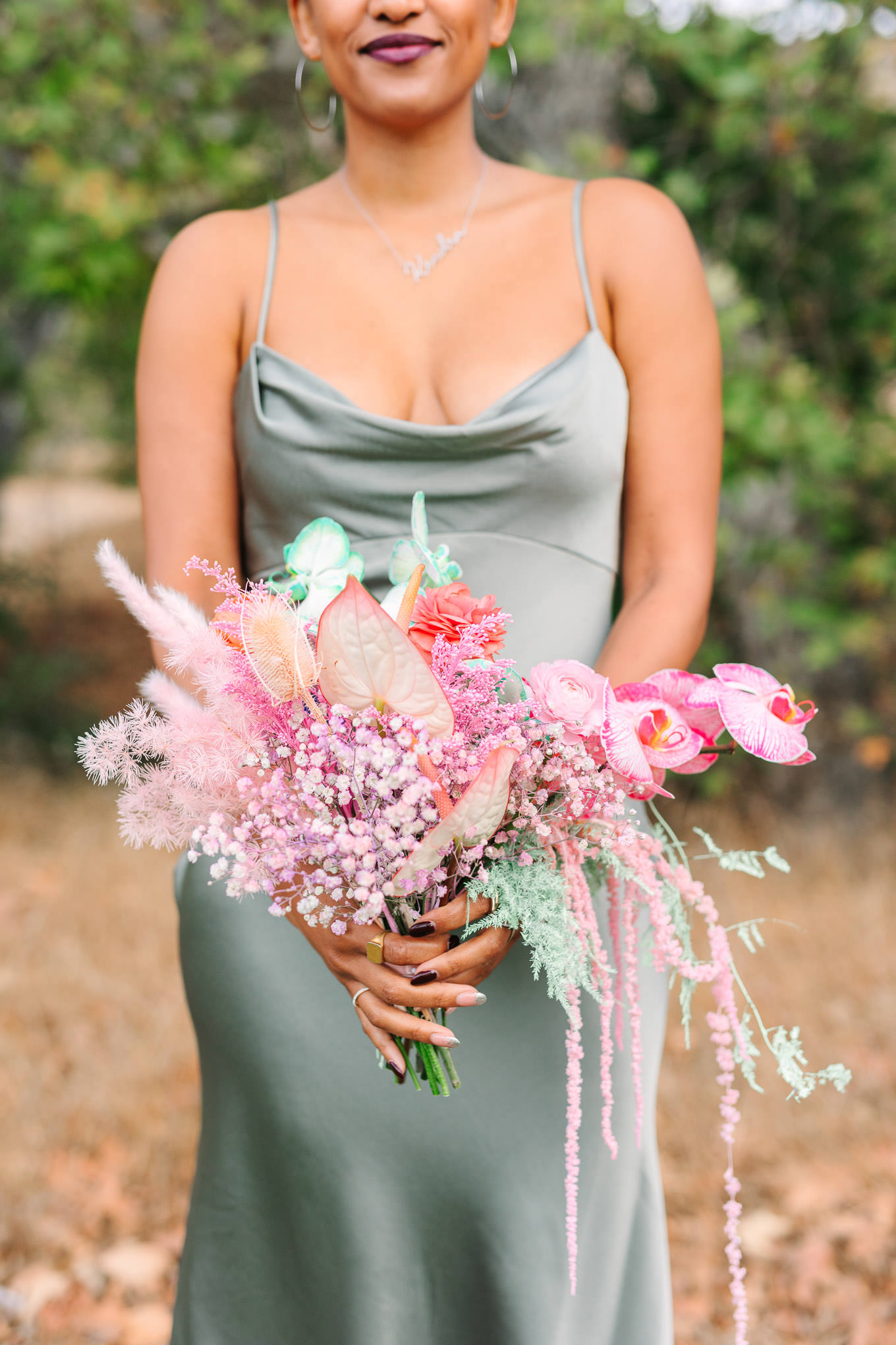 Bridesmaid in sage green gowns with colorful bouquets | Colorful and quirky wedding at Higuera Ranch in San Luis Obispo | #sanluisobispowedding #californiawedding #higueraranch #madonnainn   
Source: Mary Costa Photography | Los Angeles