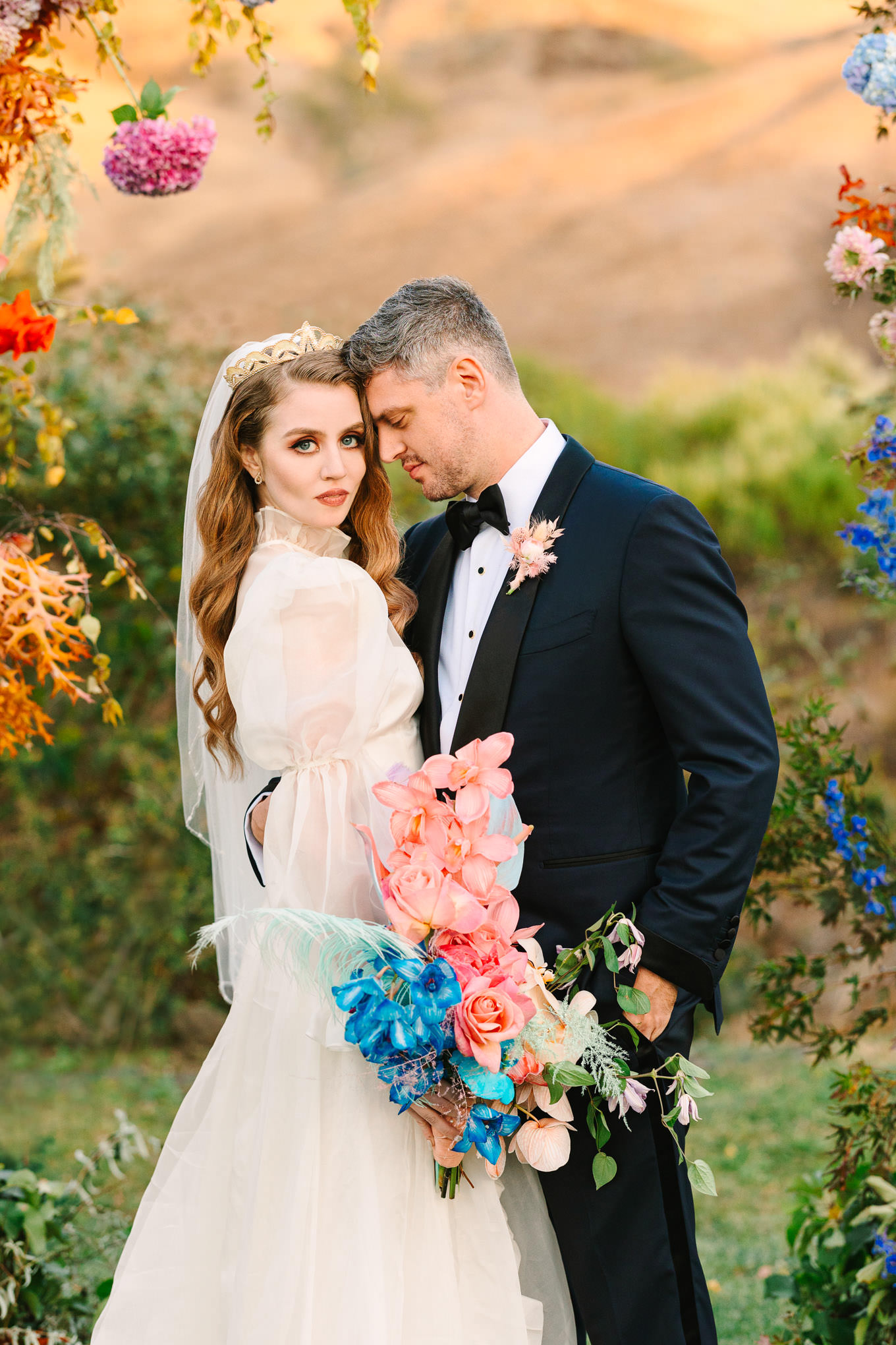 Allison Harvard & Jeremy Burke portraits at floral wedding ceremony installation | Colorful and quirky wedding at Higuera Ranch in San Luis Obispo | #sanluisobispowedding #californiawedding #higueraranch #madonnainn   

Source: Mary Costa Photography | Los Angeles