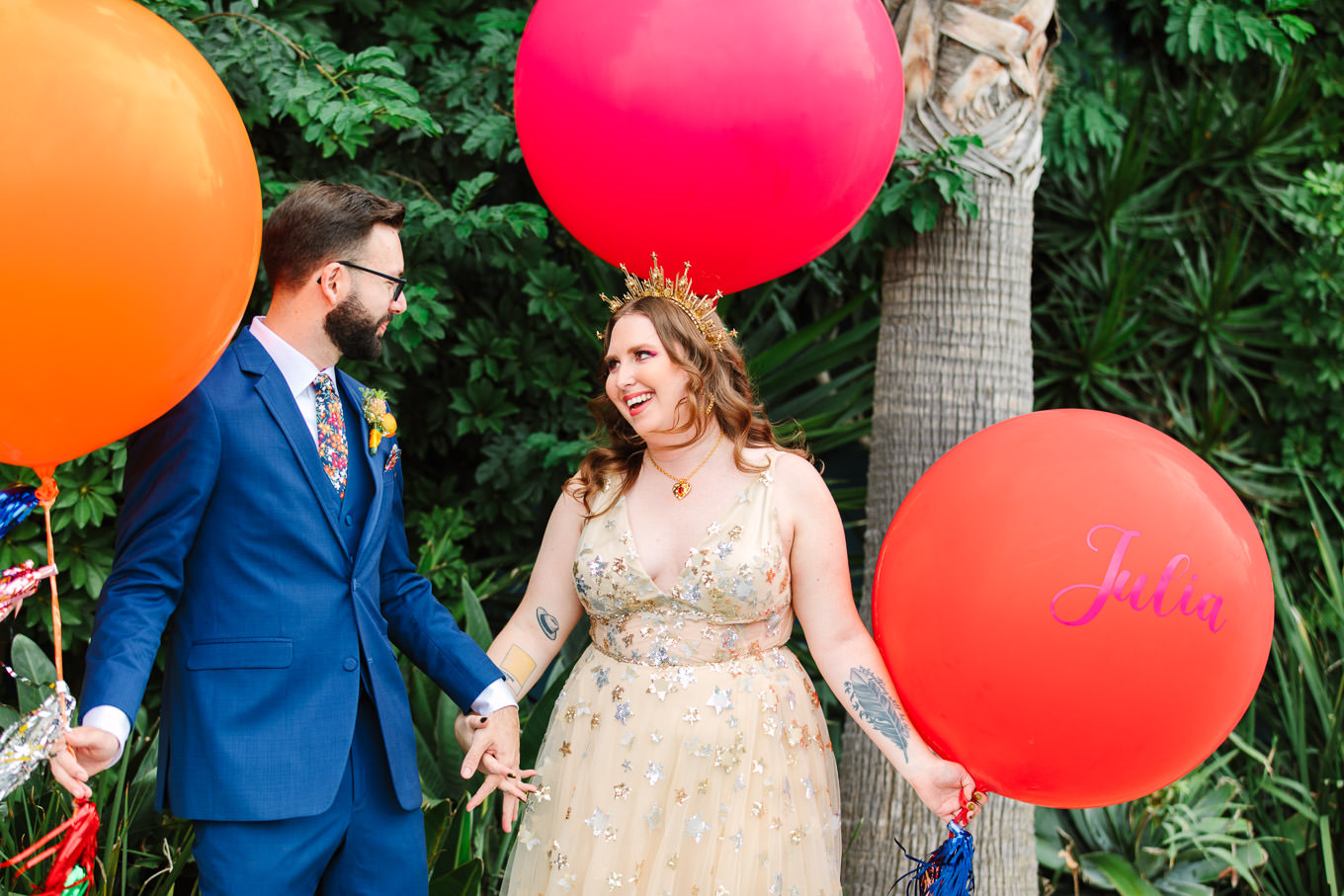 Bride and groom with colorful giant balloons First look between bride and groom | Colorful Downtown Los Angeles Valentine Wedding | Los Angeles wedding photographer | #losangeleswedding #colorfulwedding #DTLA #valentinedtla   Source: Mary Costa Photography | Los Angeles
