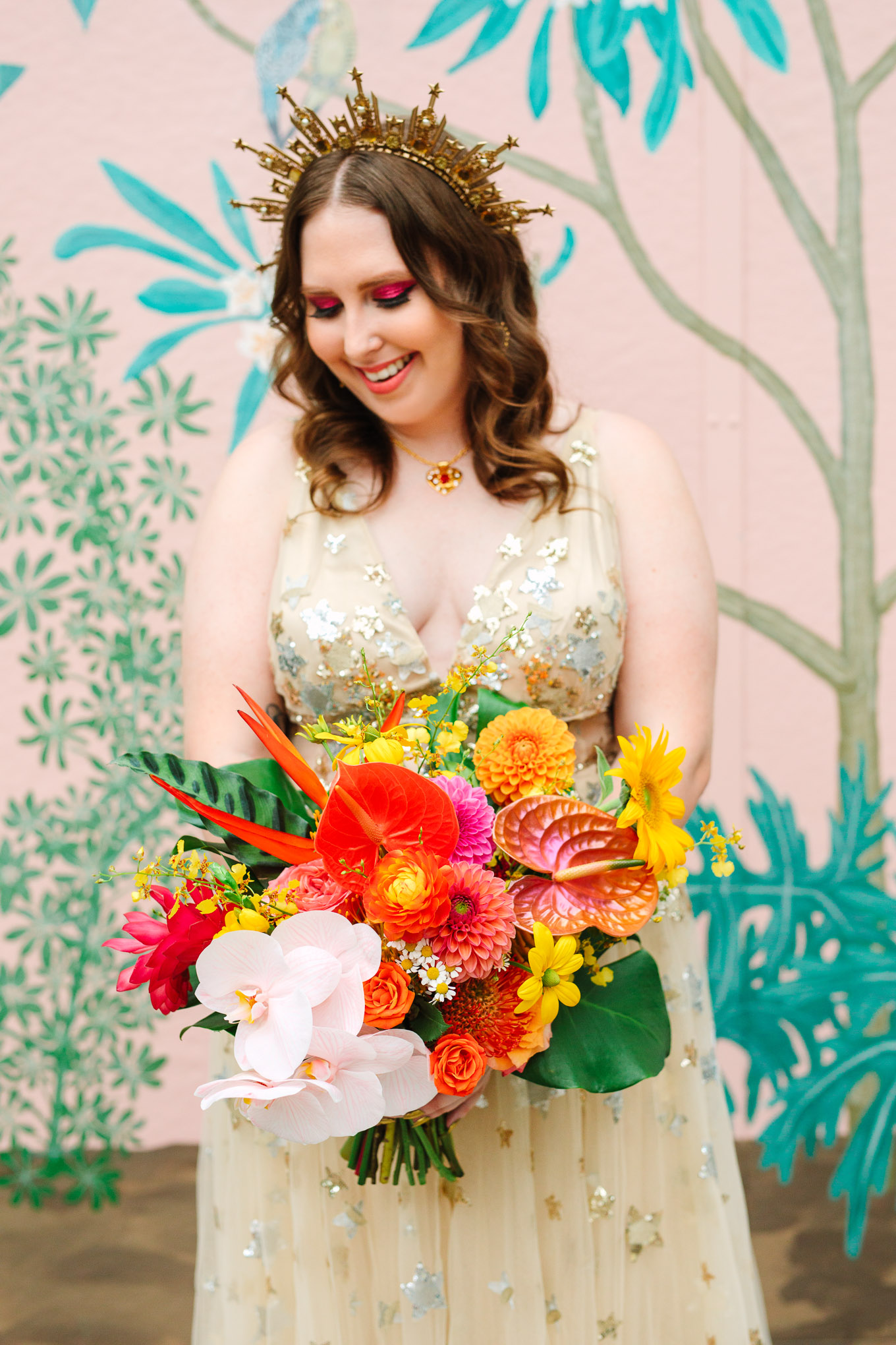 Bride holding tropical vibrant bouquet | Colorful Downtown Los Angeles Valentine Wedding | Los Angeles wedding photographer | #losangeleswedding #colorfulwedding #DTLA #valentinedtla   Source: Mary Costa Photography | Los Angeles
