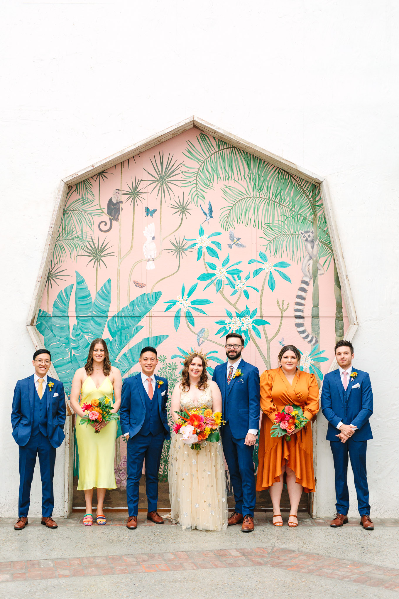 Colorful wedding party in front of mural | Colorful Downtown Los Angeles Valentine Wedding | Los Angeles wedding photographer | #losangeleswedding #colorfulwedding #DTLA #valentinedtla   Source: Mary Costa Photography | Los Angeles