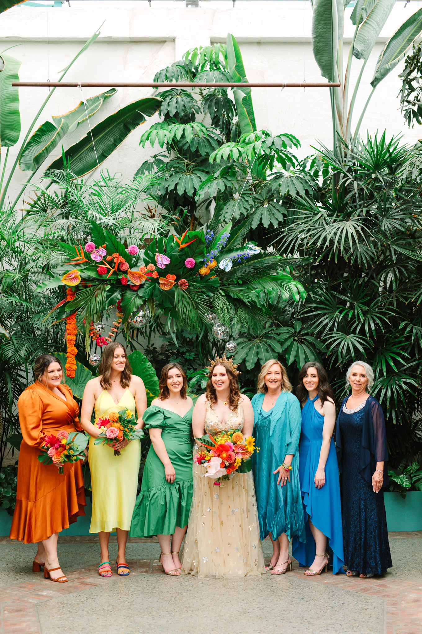 Bride with loved ones in rainbow formation | Colorful Downtown Los Angeles Valentine Wedding | Los Angeles wedding photographer | #losangeleswedding #colorfulwedding #DTLA #valentinedtla   Source: Mary Costa Photography | Los Angeles