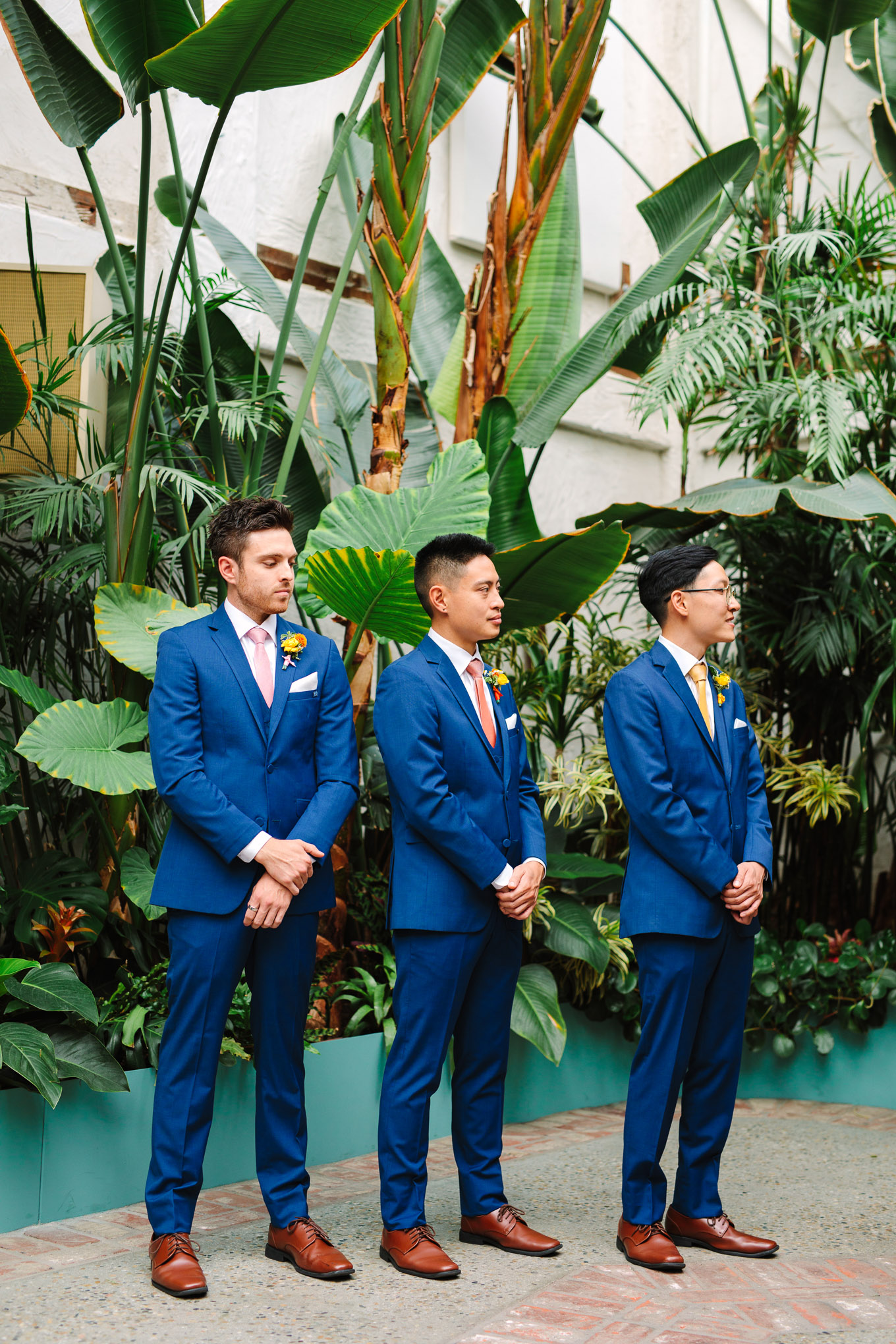 Groomsmen during wedding ceremony | Colorful Downtown Los Angeles Valentine Wedding | Los Angeles wedding photographer | #losangeleswedding #colorfulwedding #DTLA #valentinedtla   Source: Mary Costa Photography | Los Angeles