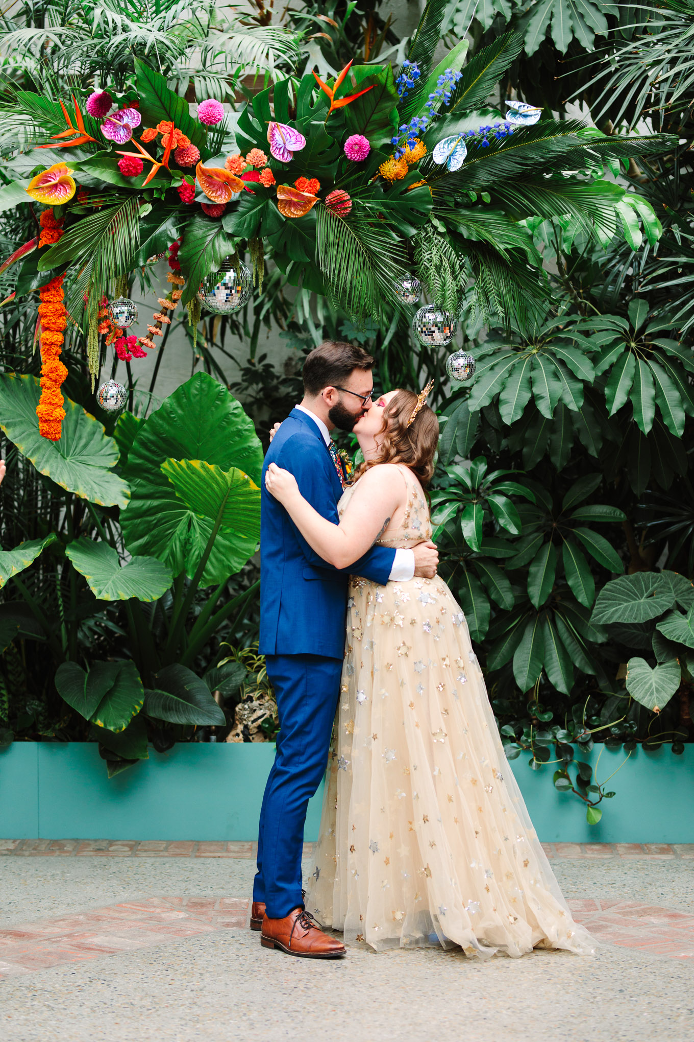 First kiss as husband and wife at wedding | Colorful Downtown Los Angeles Valentine Wedding | Los Angeles wedding photographer | #losangeleswedding #colorfulwedding #DTLA #valentinedtla   Source: Mary Costa Photography | Los Angeles