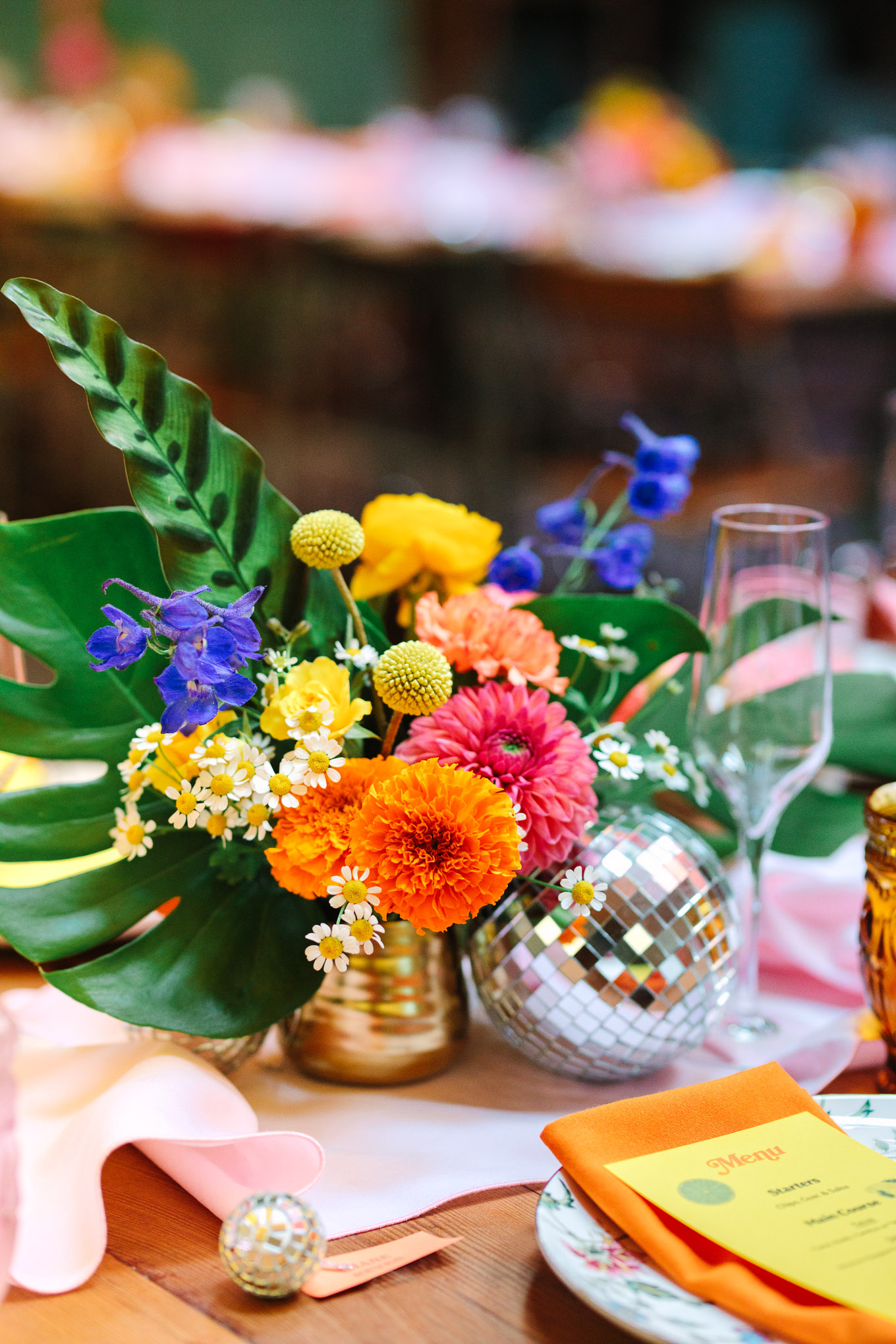 Colorful flowers and disco ball and flower centerpiece