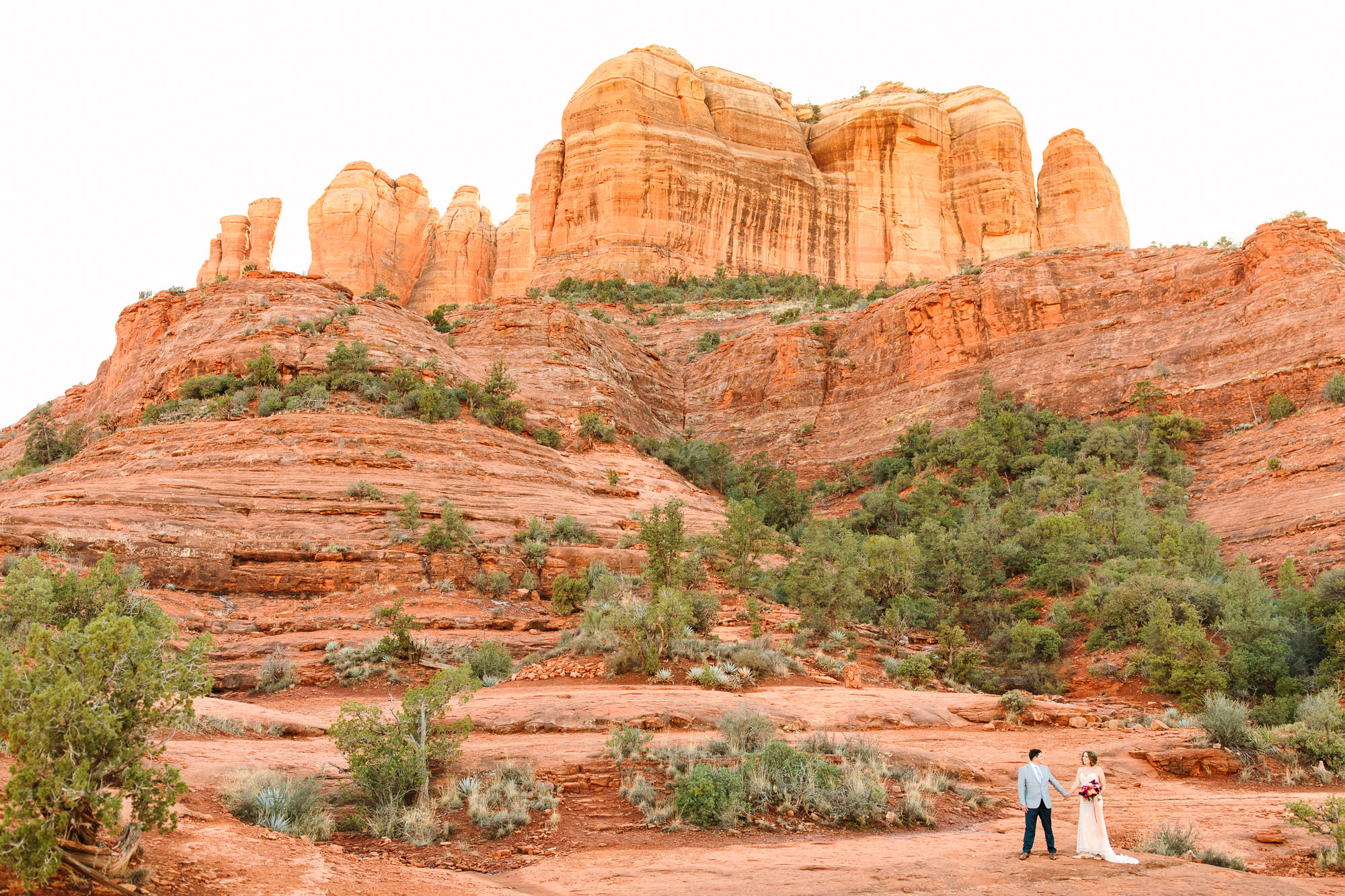 Wedding couple at Cathedral Rock Sedona by Mary Costa Photography