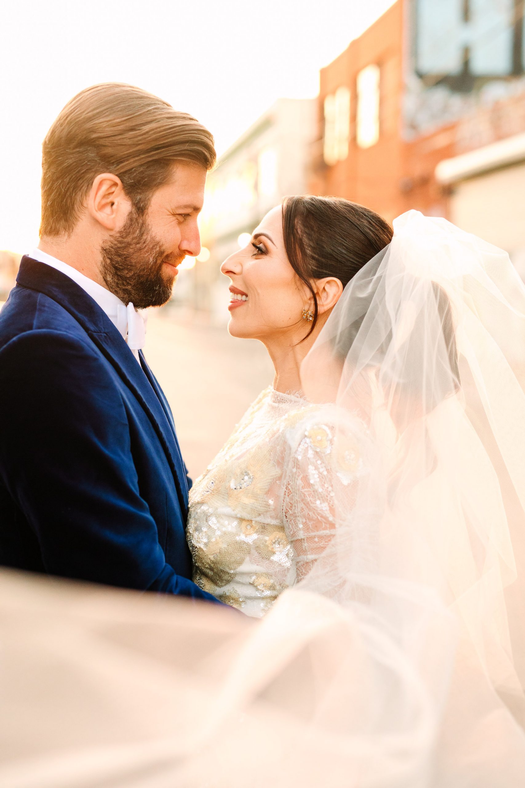 Wedding portrait with veil by Mary Costa Photography