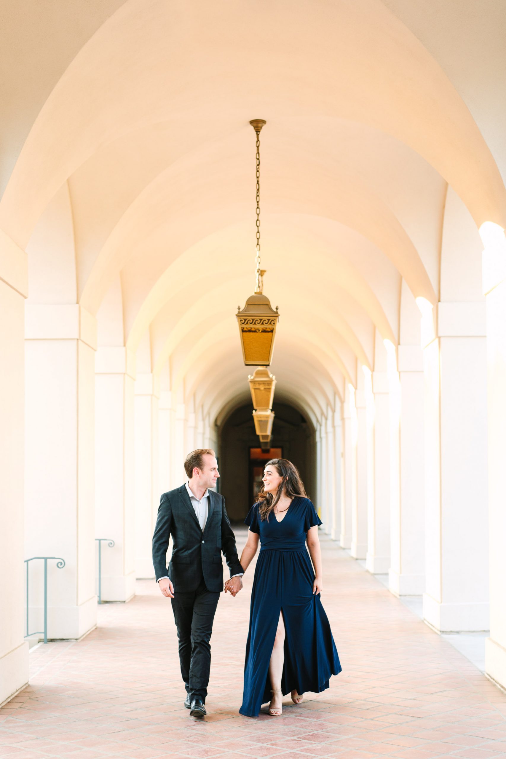 Couple walking at Pasadena Town Hall by Mary Costa Photography