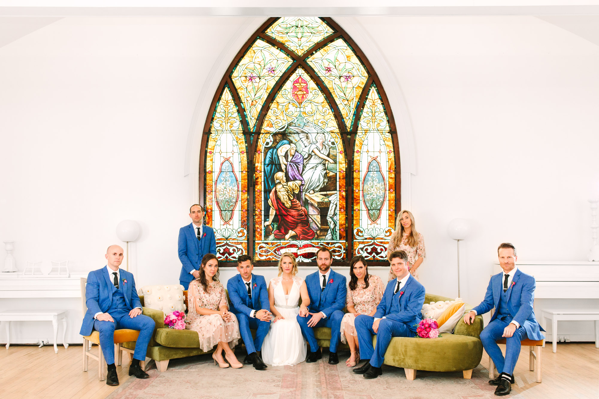 Wedding party with stained glass window at The Ruby Street Highland Park - www.marycostaweddings.com