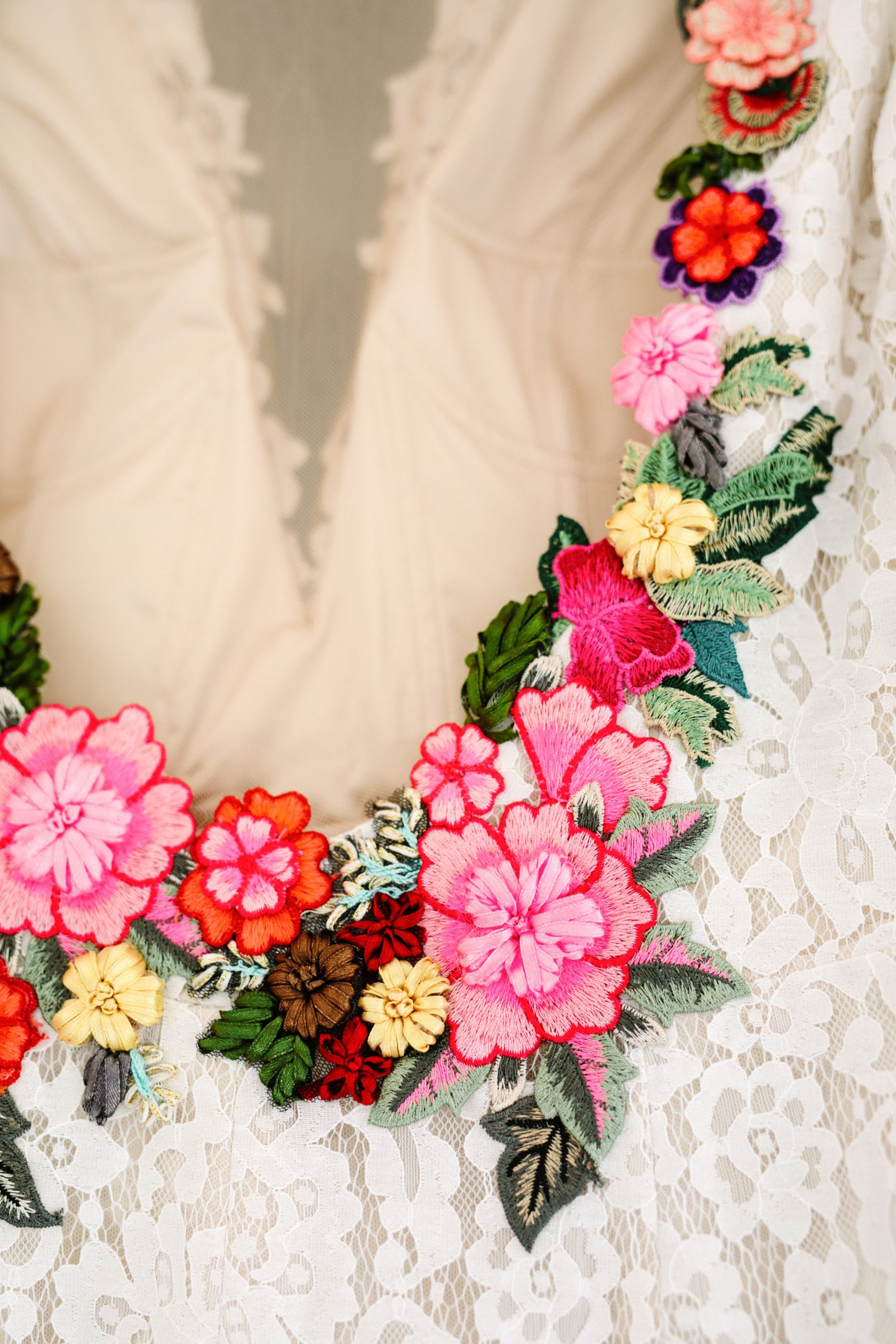 Custom bridal gown with colorful embroidered flowers by Heirloom Bride - www.marycostaweddings.com