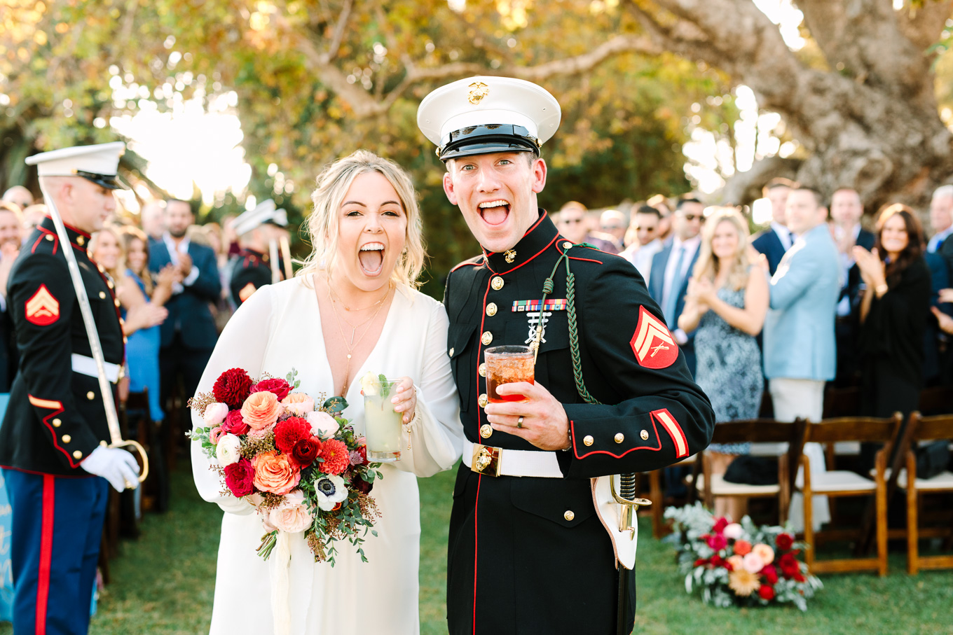 Bride and Marine groom leaving Adamson House Malibu wedding ceremony | Best Southern California Garden Wedding Venues | Colorful and elevated wedding photography for fun-loving couples | #gardenvenue #weddingvenue #socalweddingvenue #bouquetideas #uniquebouquet   Source: Mary Costa Photography | Los Angeles 