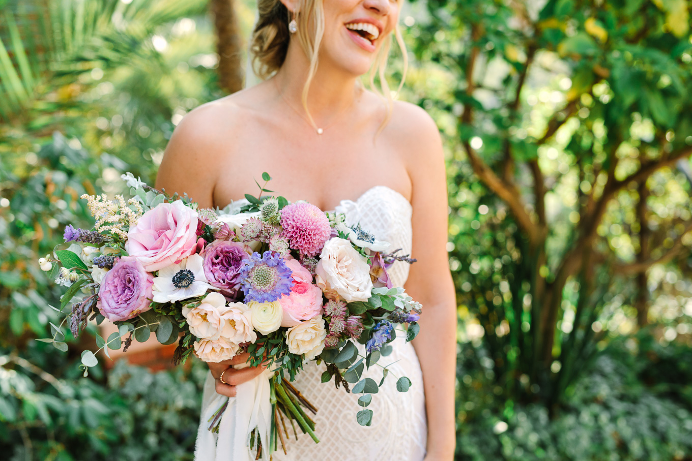 Bride with purple bouquet at Houdini Estate wedding | Best Southern California Garden Wedding Venues | Colorful and elevated wedding photography for fun-loving couples | #gardenvenue #weddingvenue #socalweddingvenue #bouquetideas #uniquebouquet   Source: Mary Costa Photography | Los Angeles 
