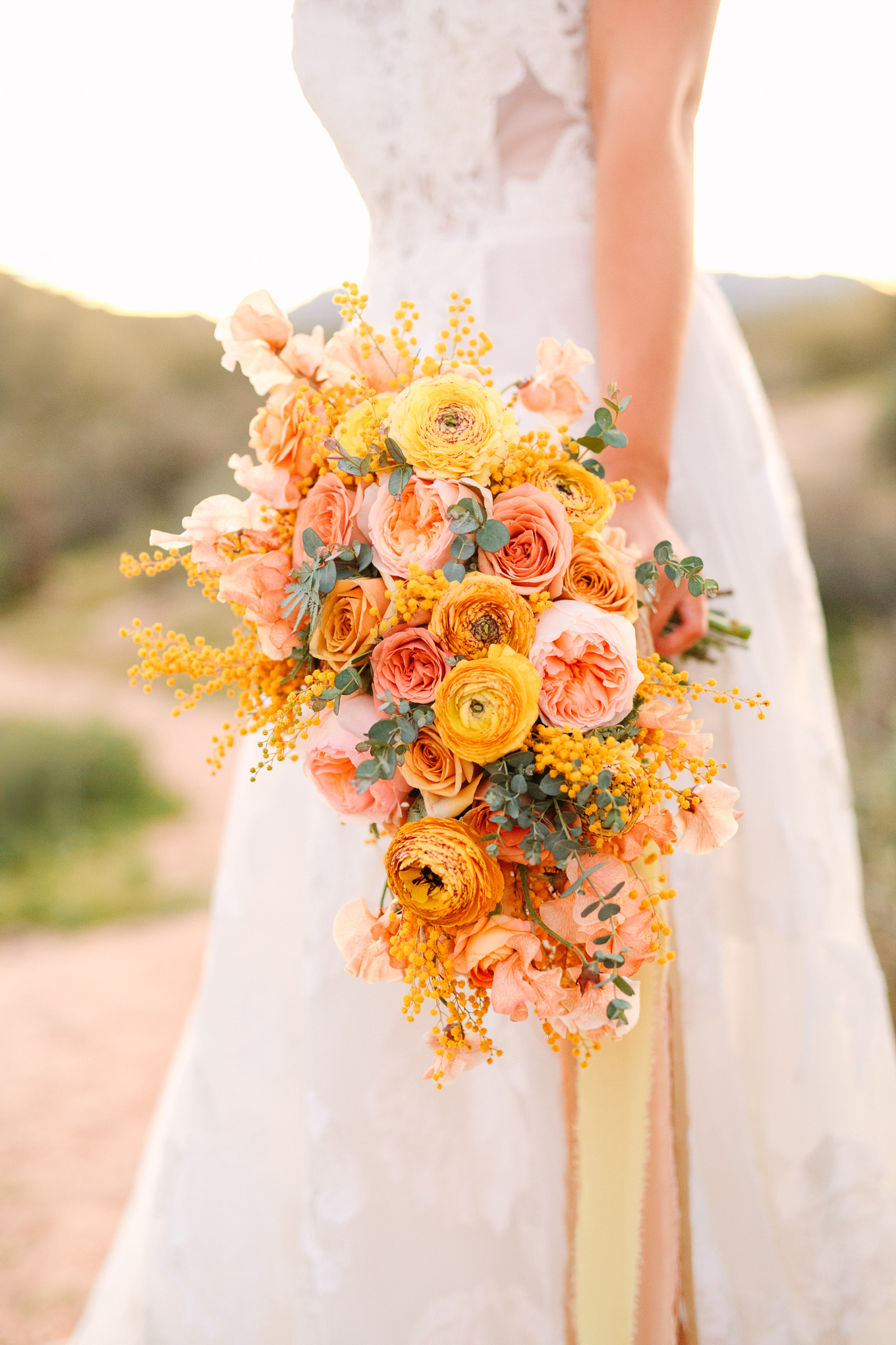 Mustard yellow and peach wedding bouquet | Beautiful bridal bouquet inspiration and advice | Colorful and elevated wedding photography for fun-loving couples in Southern California | #weddingflowers #weddingbouquet #bridebouquet #bouquetideas #uniquebouquet   Source: Mary Costa Photography | Los Angeles 