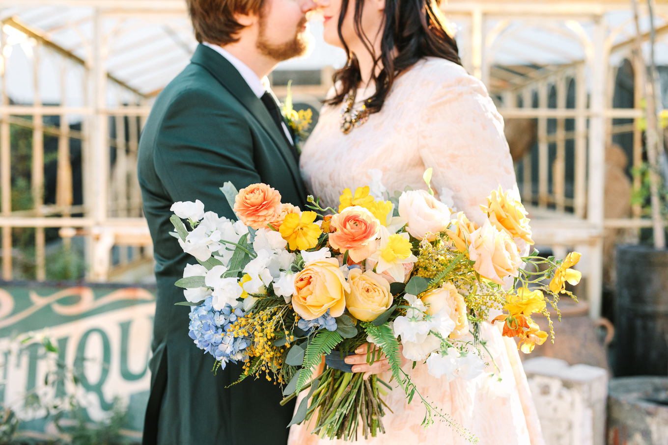 Lush yellow, peach and blue bouquet with daffodils | Beautiful bridal bouquet inspiration and advice | Colorful and elevated wedding photography for fun-loving couples in Southern California | #weddingflowers #weddingbouquet #bridebouquet #bouquetideas #uniquebouquet   Source: Mary Costa Photography | Los Angeles