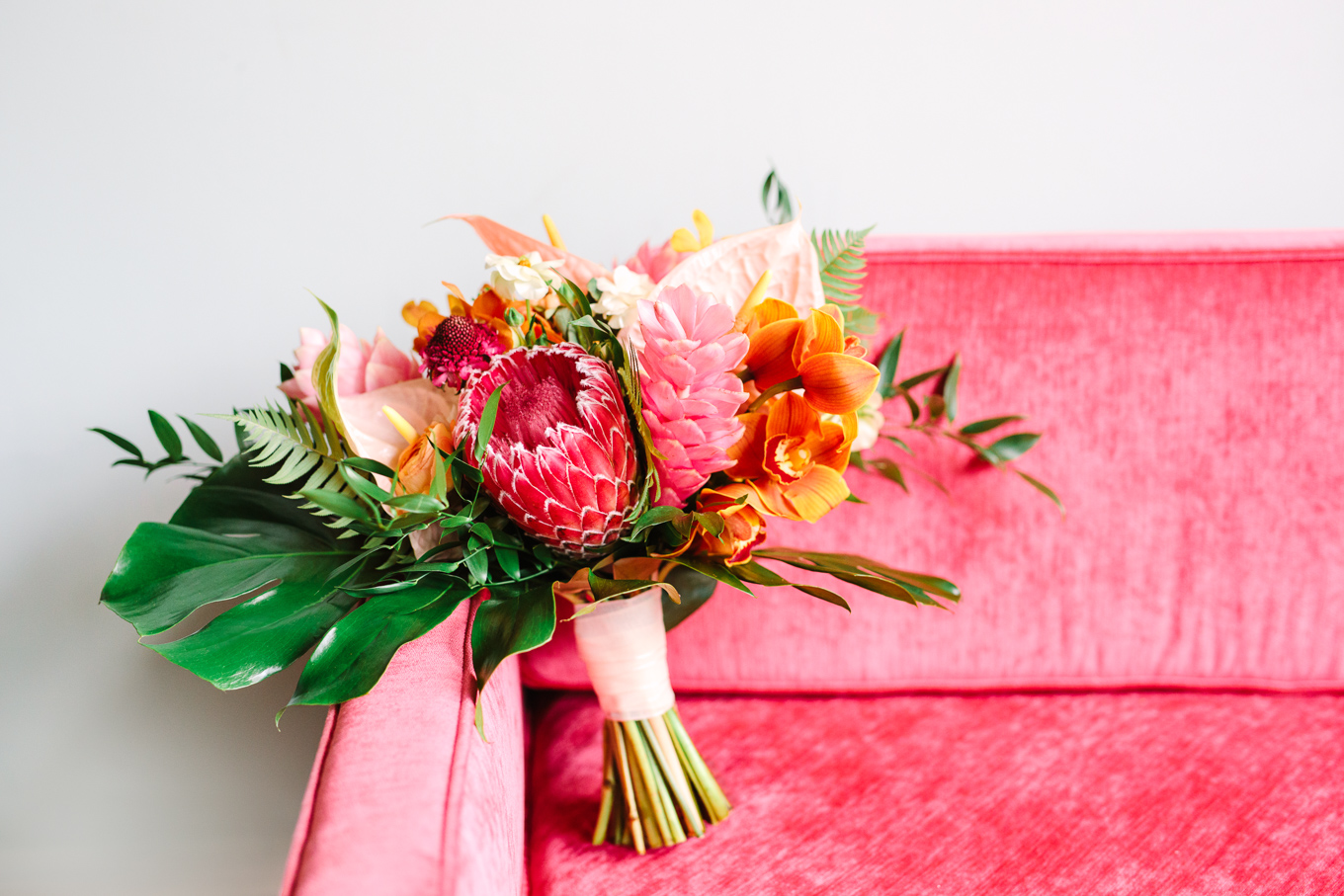 Tropical pink bouquet at The Fig House | Beautiful bridal bouquet inspiration and advice | Colorful and elevated wedding photography for fun-loving couples in Southern California | #weddingflowers #weddingbouquet #bridebouquet #bouquetideas #uniquebouquet   Source: Mary Costa Photography | Los Angeles