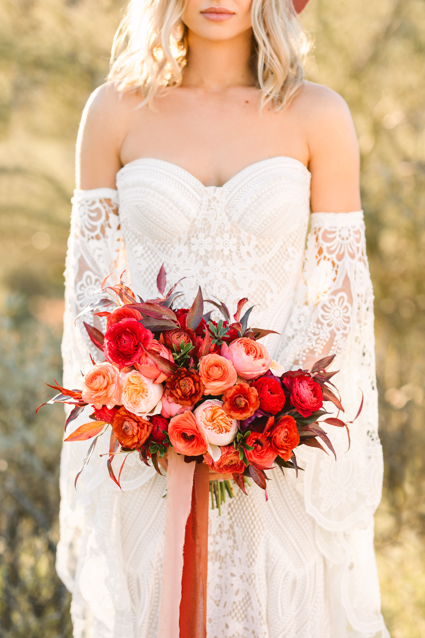 Red colorful boho wedding flowers | Beautiful bridal bouquet inspiration and advice | Colorful and elevated wedding photography for fun-loving couples in Southern California | #weddingflowers #weddingbouquet #bridebouquet #bouquetideas #uniquebouquet   Source: Mary Costa Photography | Los Angeles