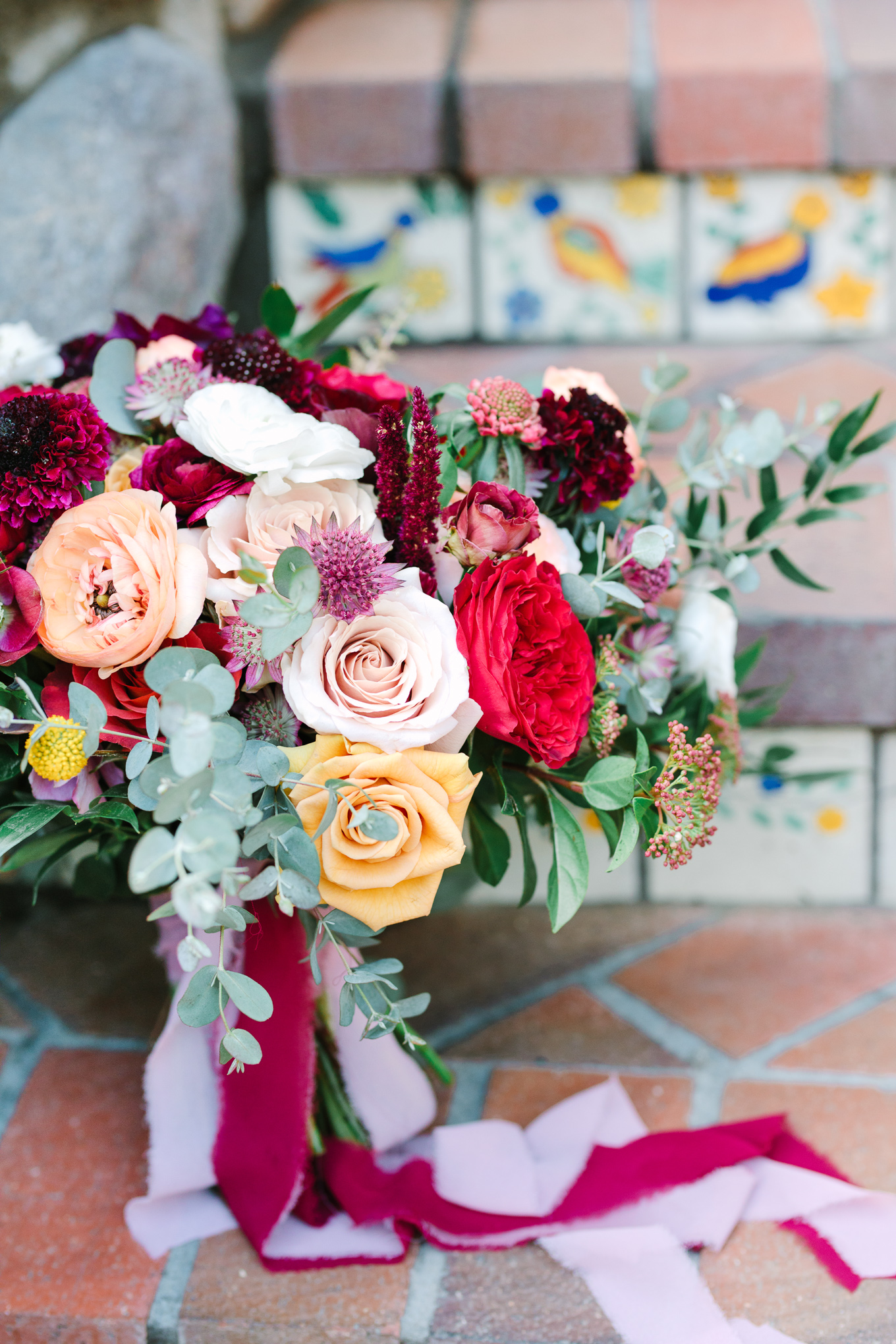 Winter red organic wedding flowers | Beautiful bridal bouquet inspiration and advice | Colorful and elevated wedding photography for fun-loving couples in Southern California | #weddingflowers #weddingbouquet #bridebouquet #bouquetideas #uniquebouquet   Source: Mary Costa Photography | Los Angeles